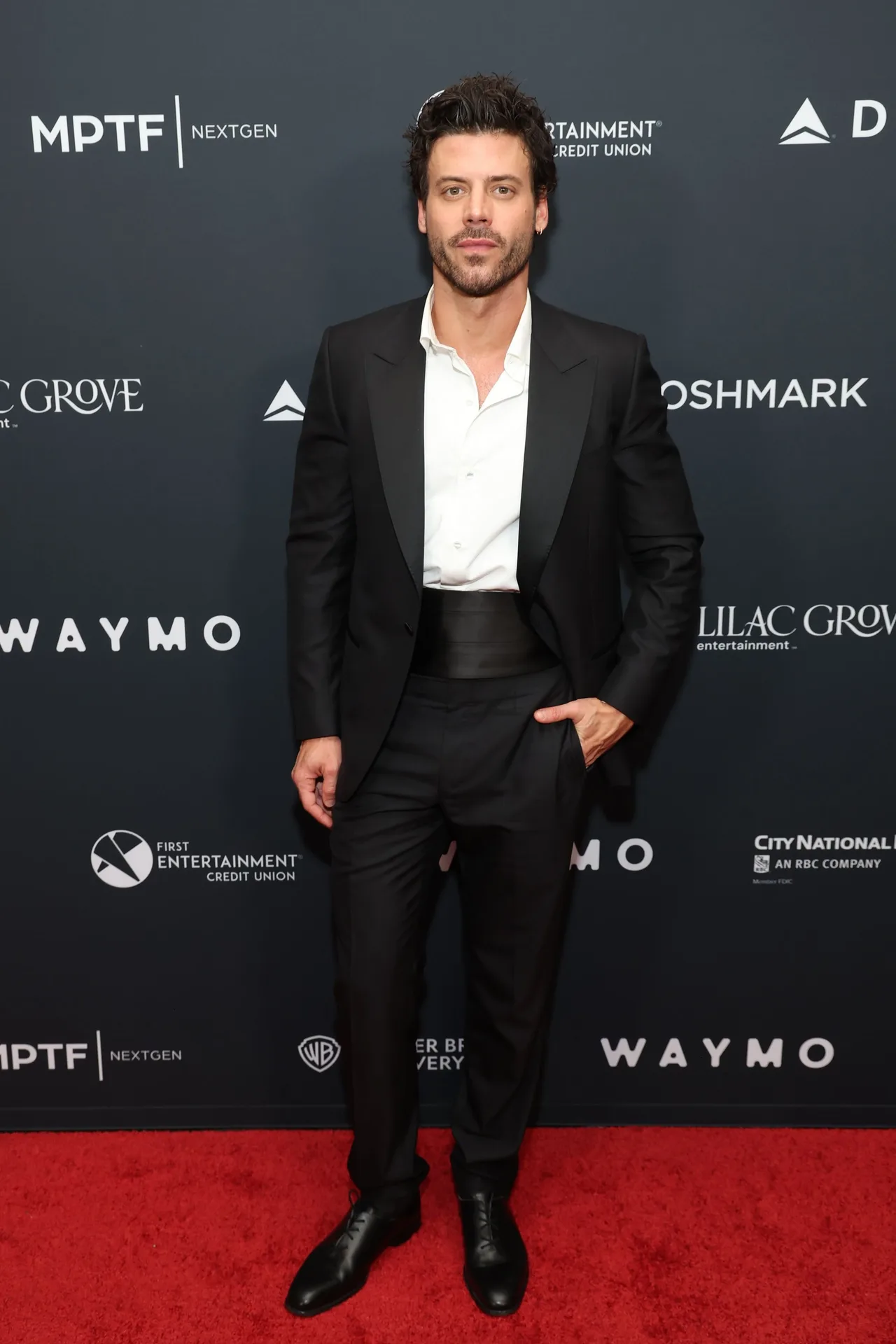 François Arnaud stylishly dresses to accept Peabody Award on behalf 'Heated Rivalry'