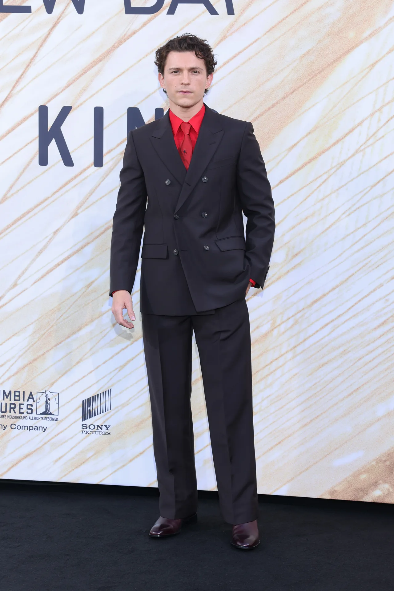 Tom Holland appears dapper in classic look with a subtle ‘Spider-Man’ reference