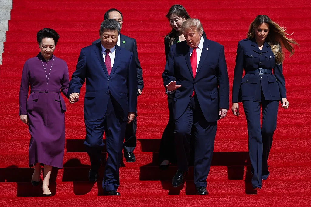 Melania closes Xi's visit in navy Ralph Lauren