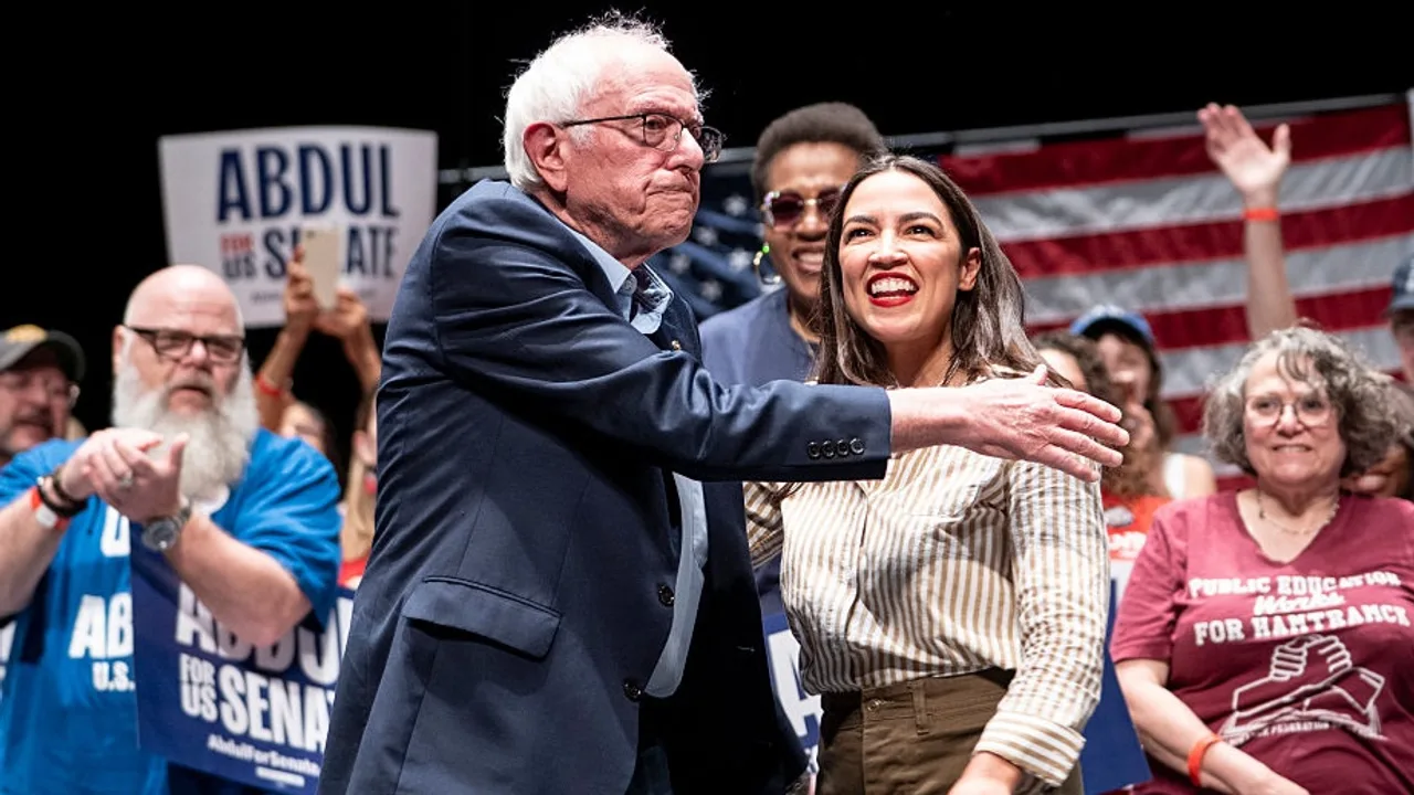 Alexandria Ocasio-Cortez and Bernie Sanders reunite at high-energy Detroit rally