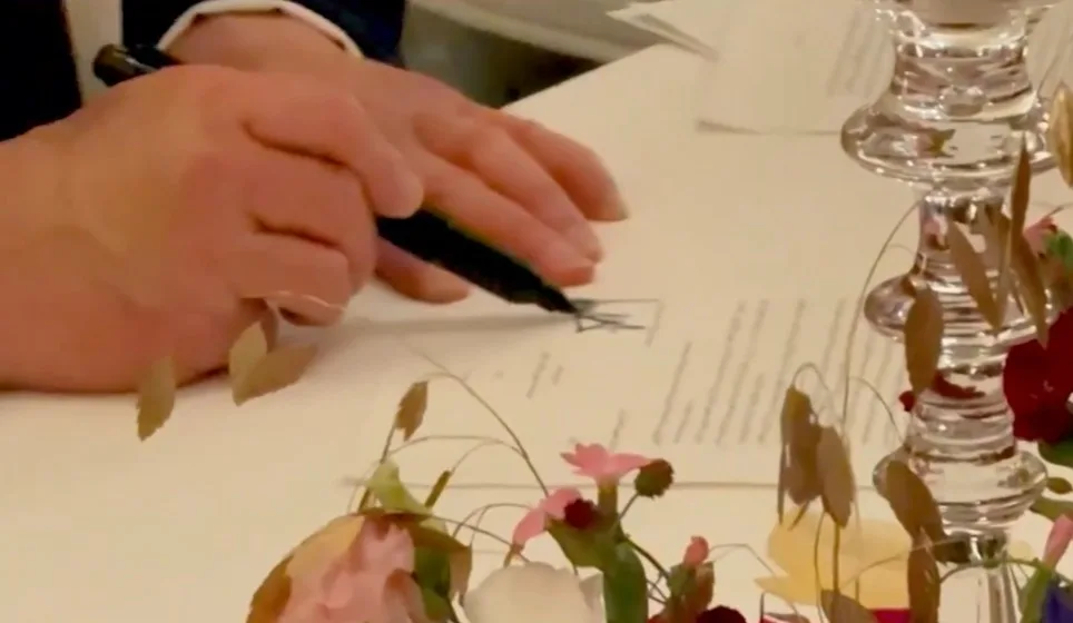 Trump picks up the pen