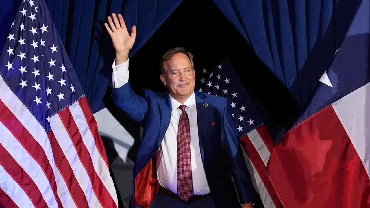 Texas Attorney General Ken Paxton, a Republican candidate for the U.S. Senate, waves as he takes the stage during a primary runoff election night event after winning the Republican party's nomination Tuesday, May 26, 2026, in Plano, Texas
