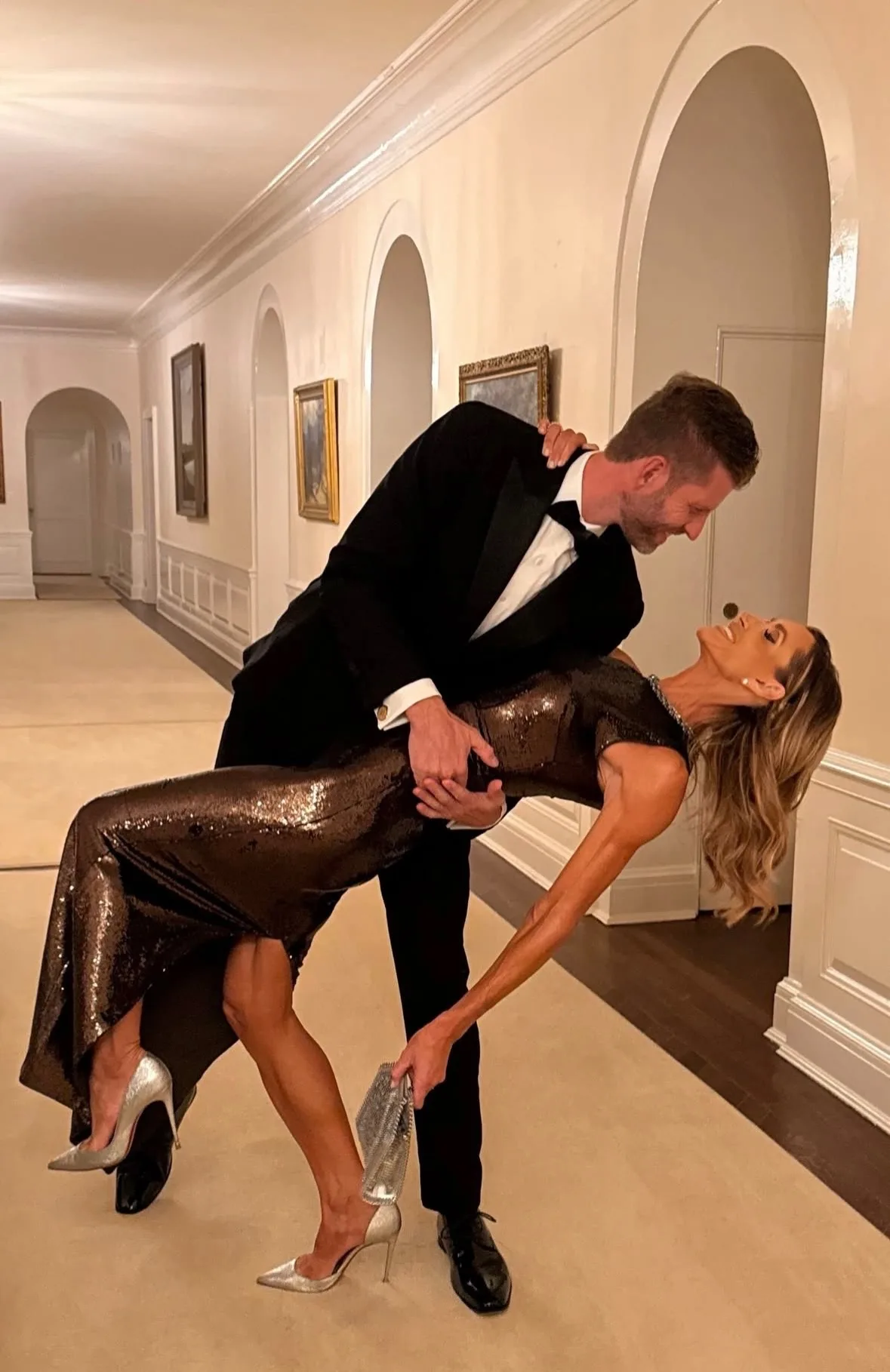 Eric literally sweeps Lara off her feet