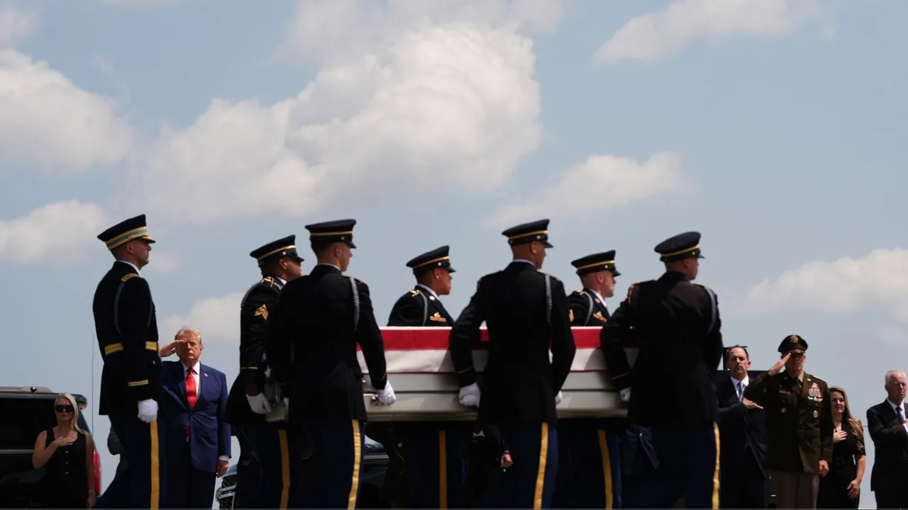 Honor Guard carry the fallen from the aircraft