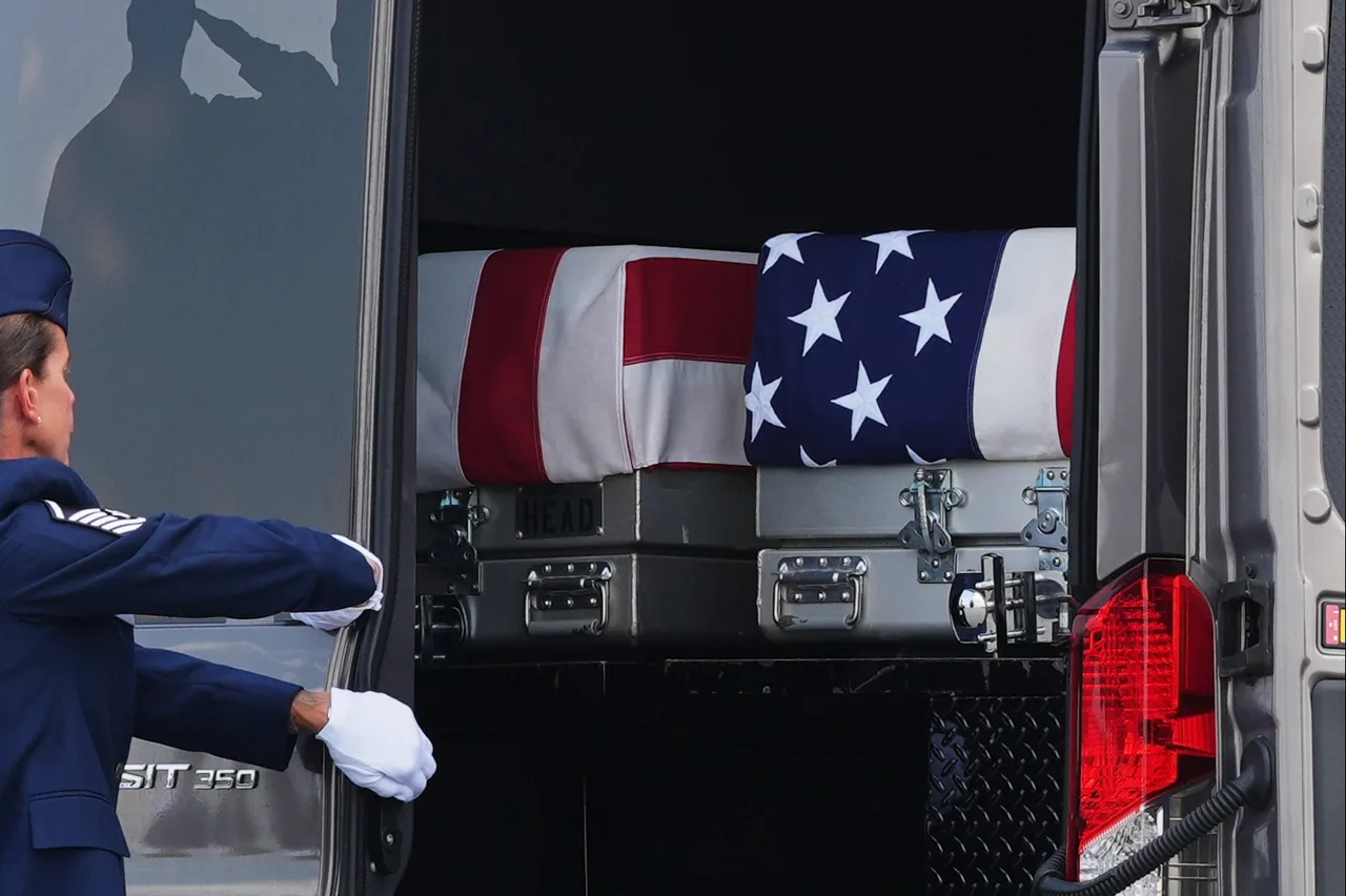 Flag-draped transfer cases return the fallen to American soil