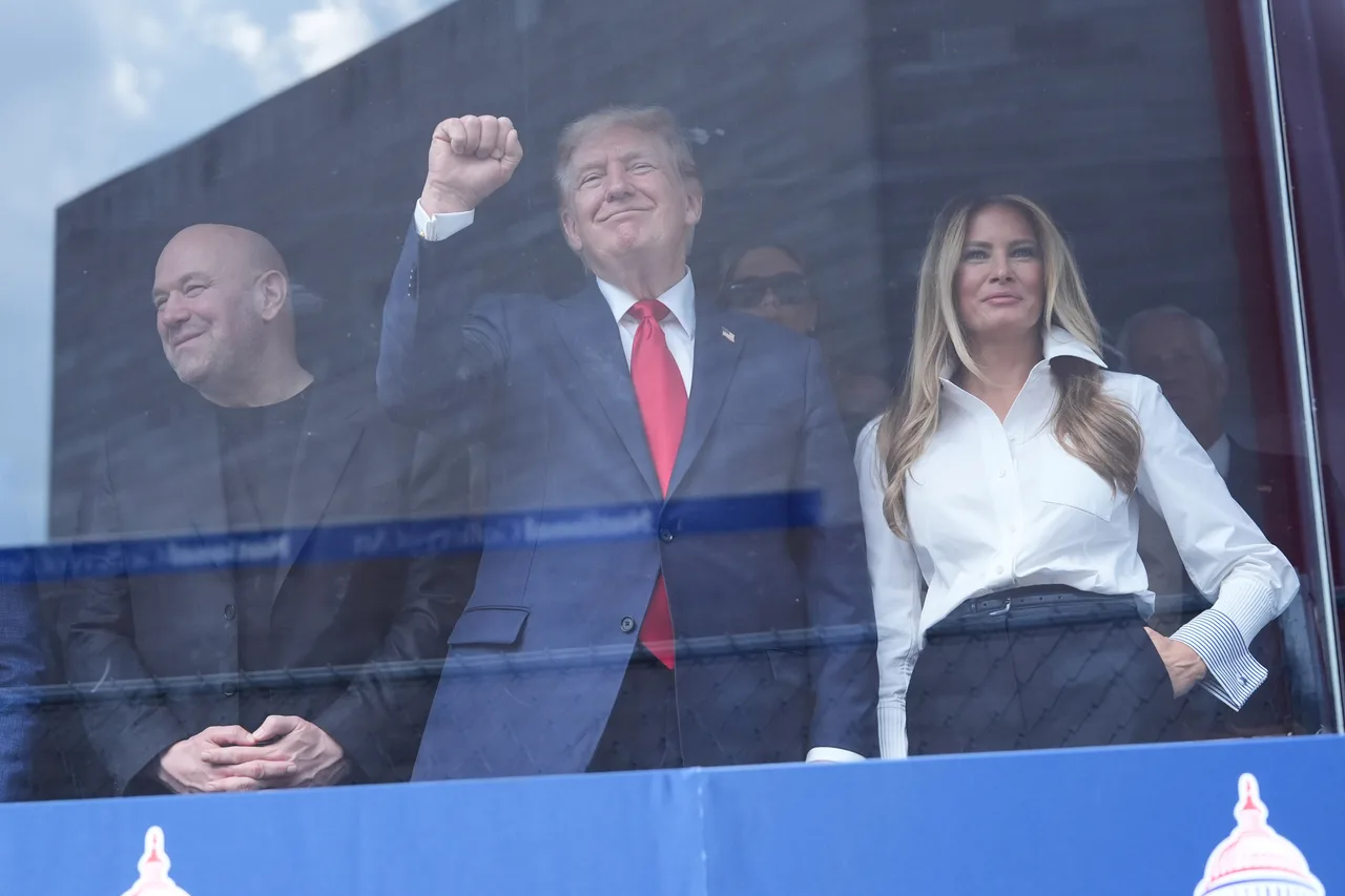Dana White watches the action alongside the first couple