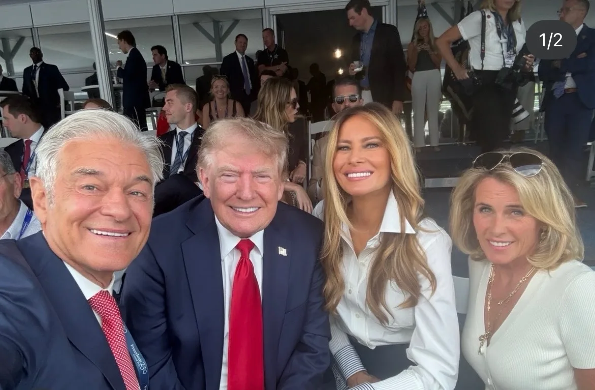 Trump and Melania pose for smiling VIP selfie