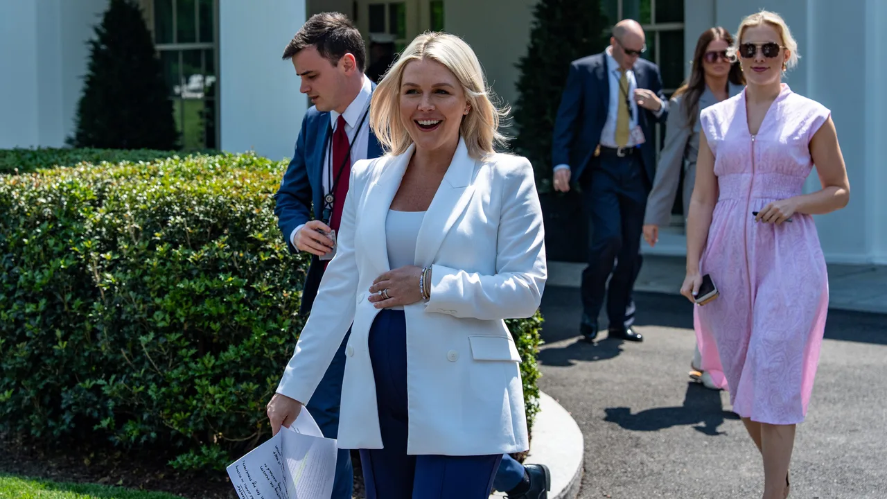White House press secretary Karoline Leavitt walks to do a television interview at the White House, Friday, April 24, 2026, in Washington (AP Photo/Alex Brandon)