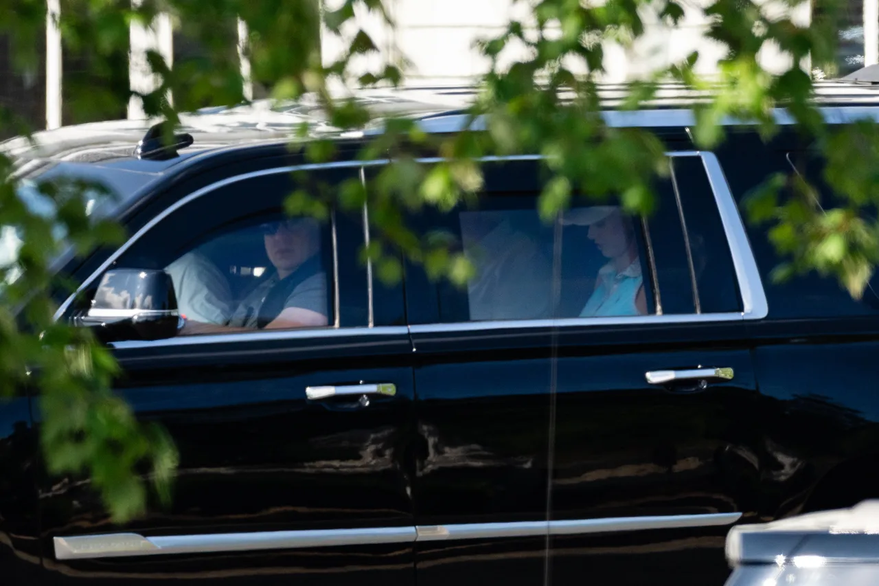 Natalie Harp rides in the presidential SUV