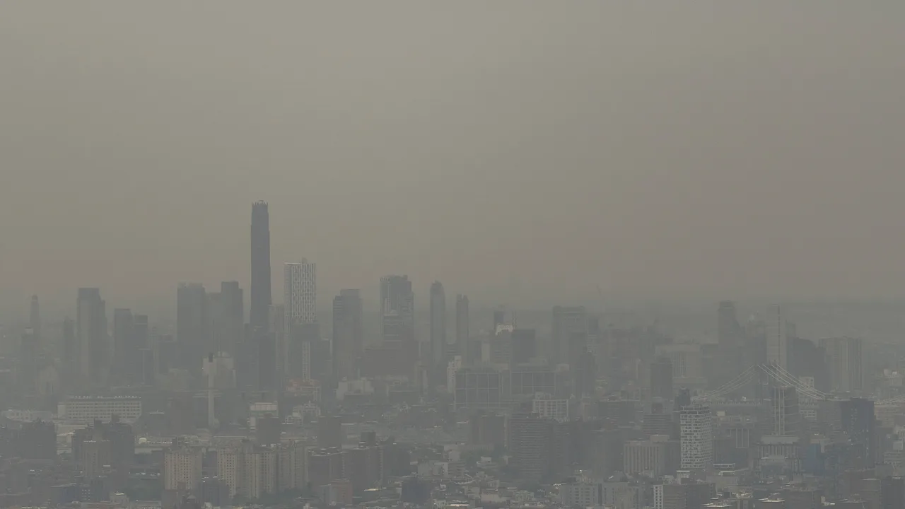 Photos show NYC skyline disappear behind Canadian wildfire smoke ahead of World Cup Final