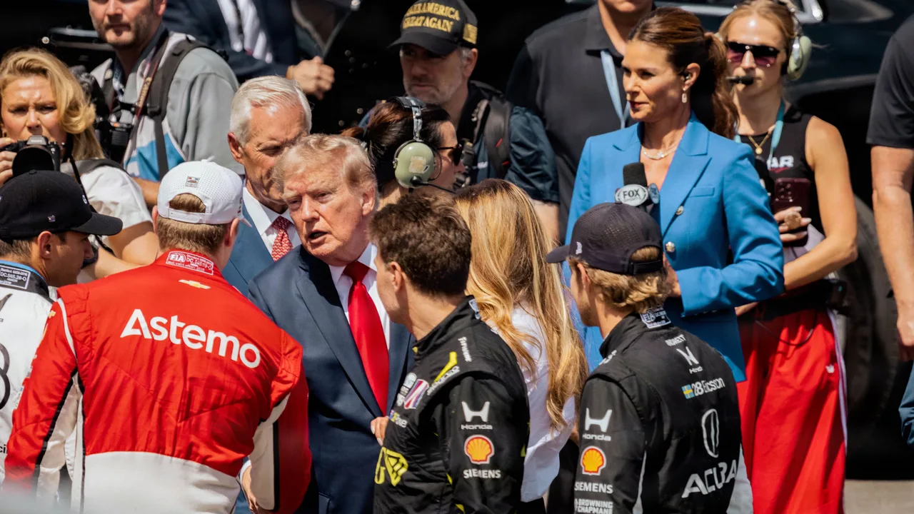 Trump and Melania greet drivers in exclusive photos as ‘The President’s Own’ fires up Freedom 250 Grand Prix