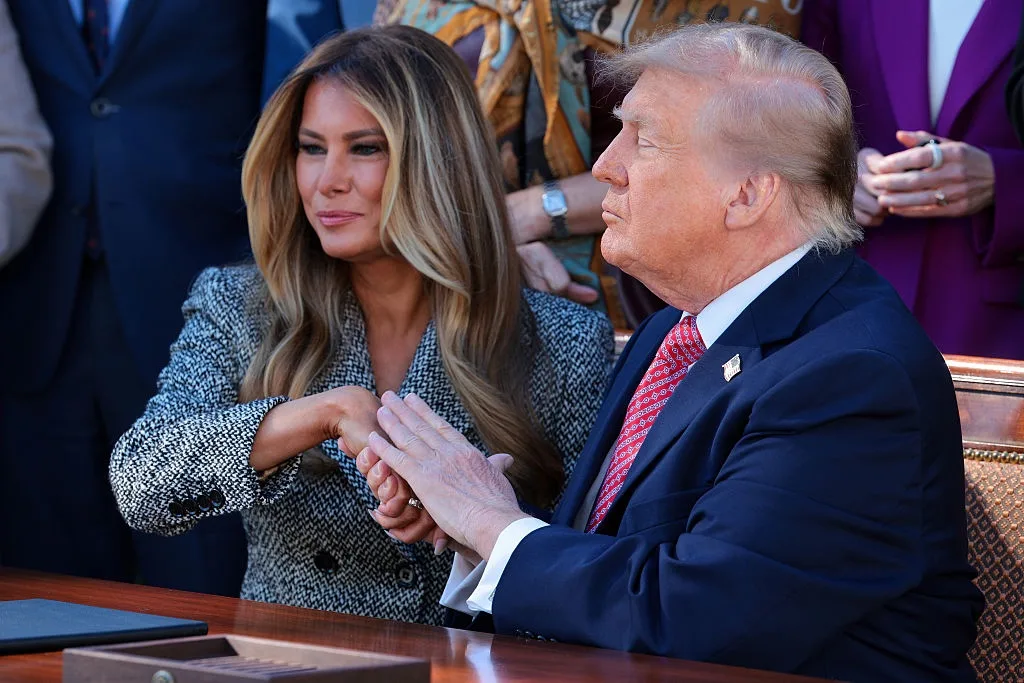 Trump and Melania share a tender hand-holding moment