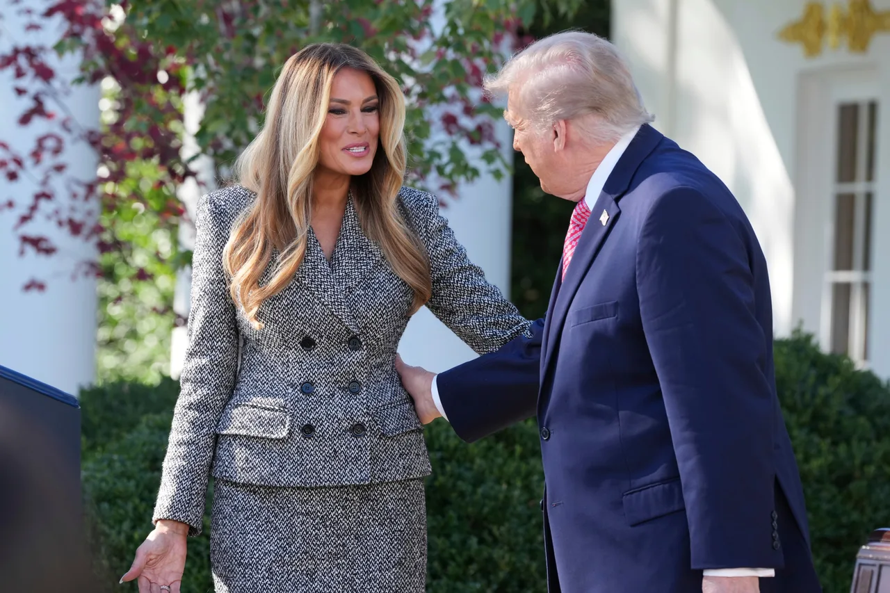 Melania and Trump exchange smiles at the podium