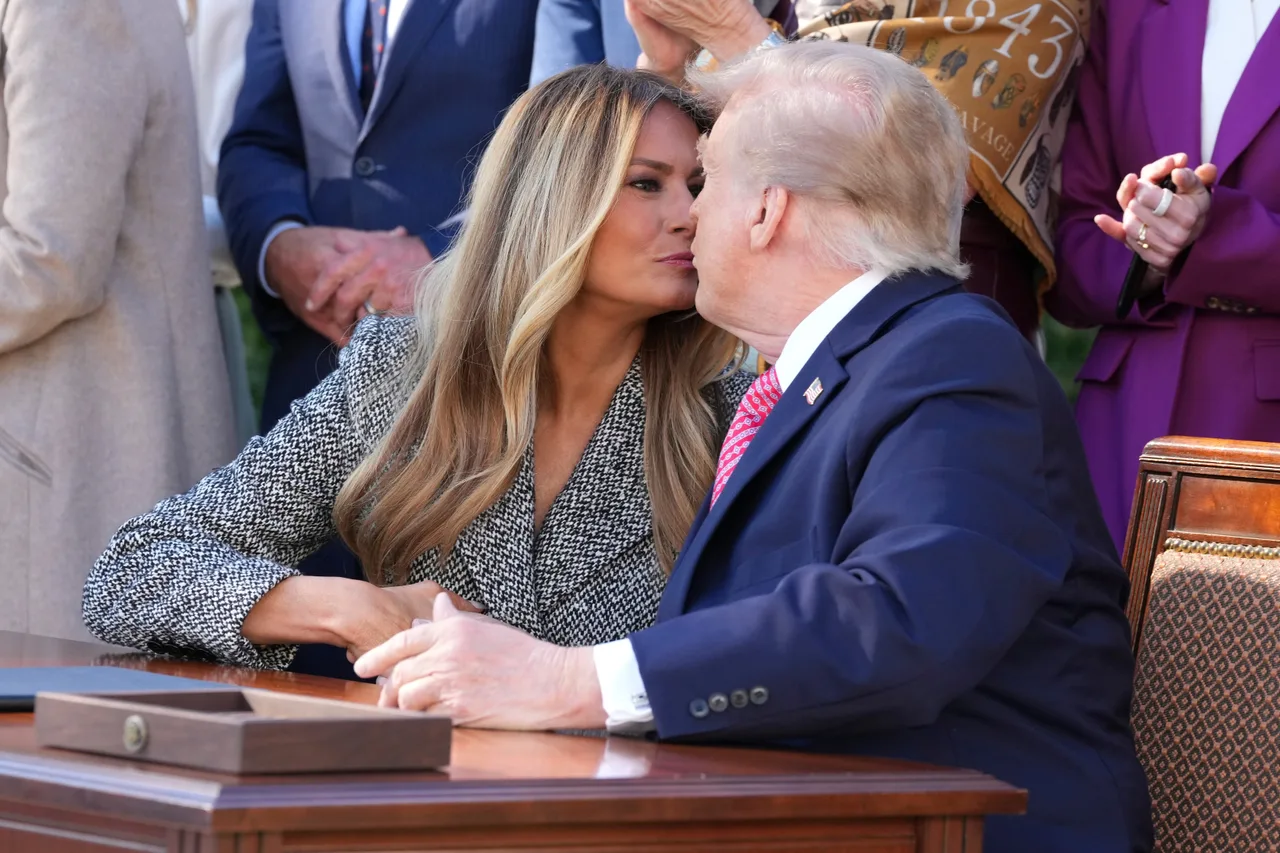 Trump and Melania seal the occasion with a kiss
