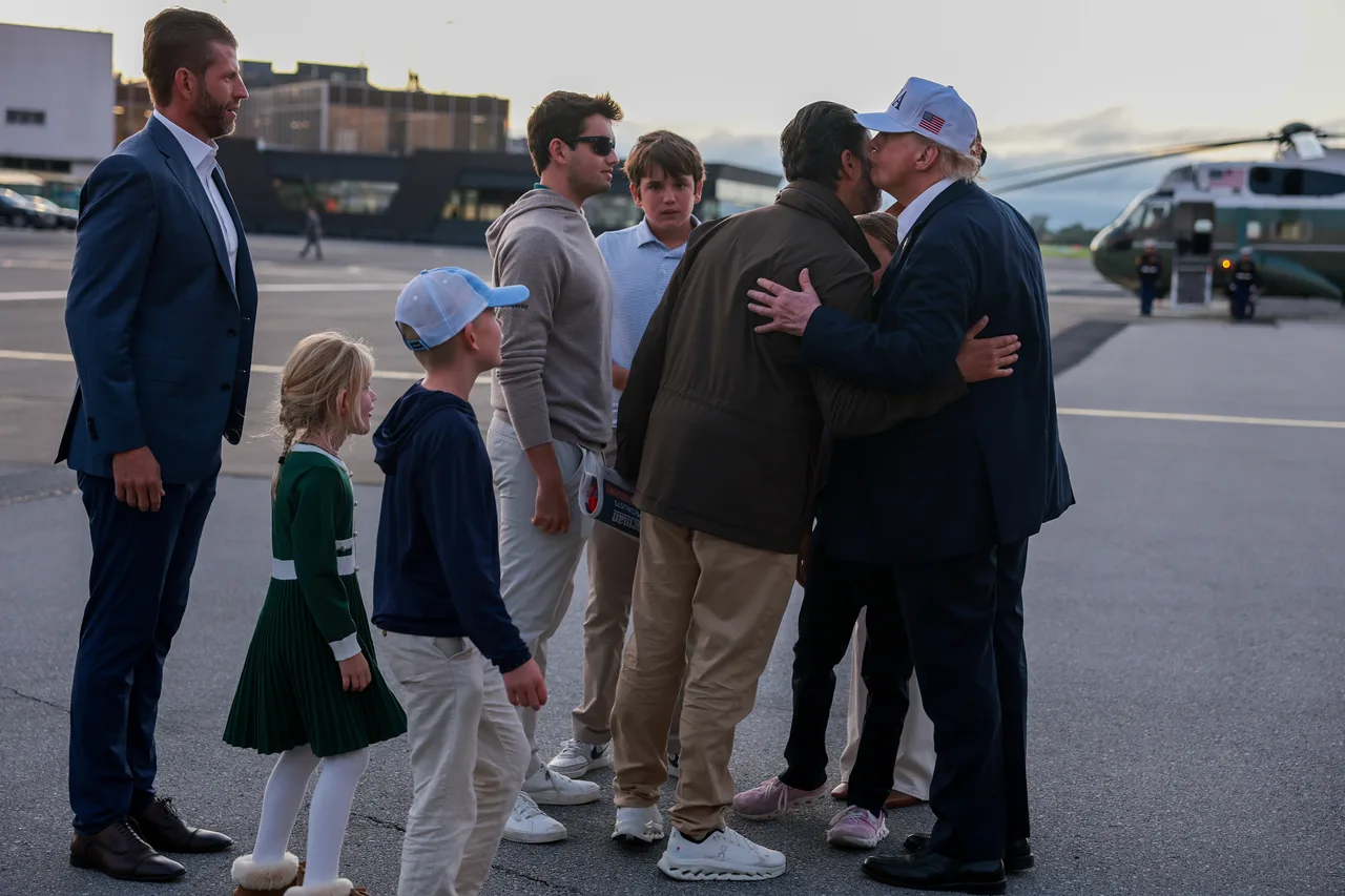Trump kisses Don Jr goodbye as the family gathers around