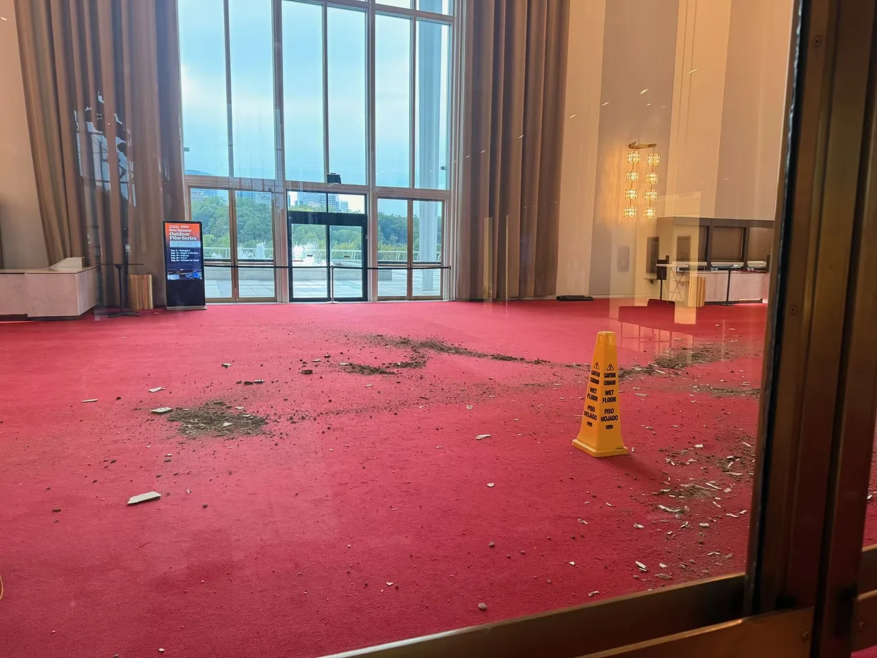 Debris covers the Kennedy Center's famous red carpet