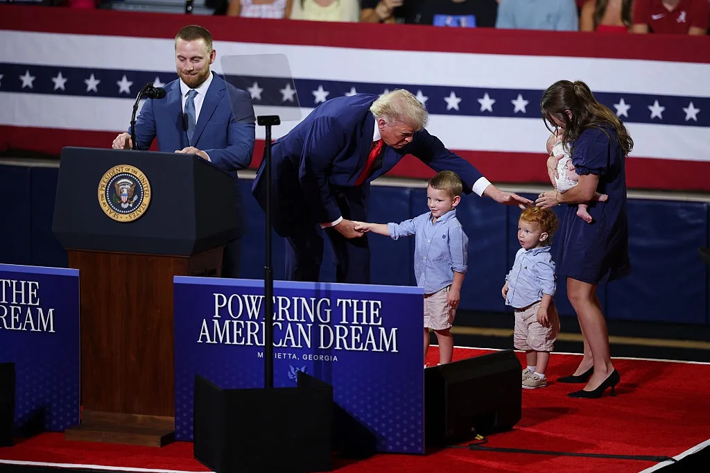 Trump looks out for young guests