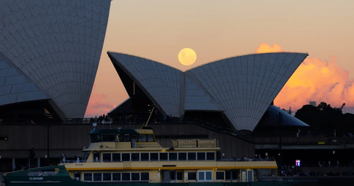 Rare Blue Moon rises over Sydney Opera House