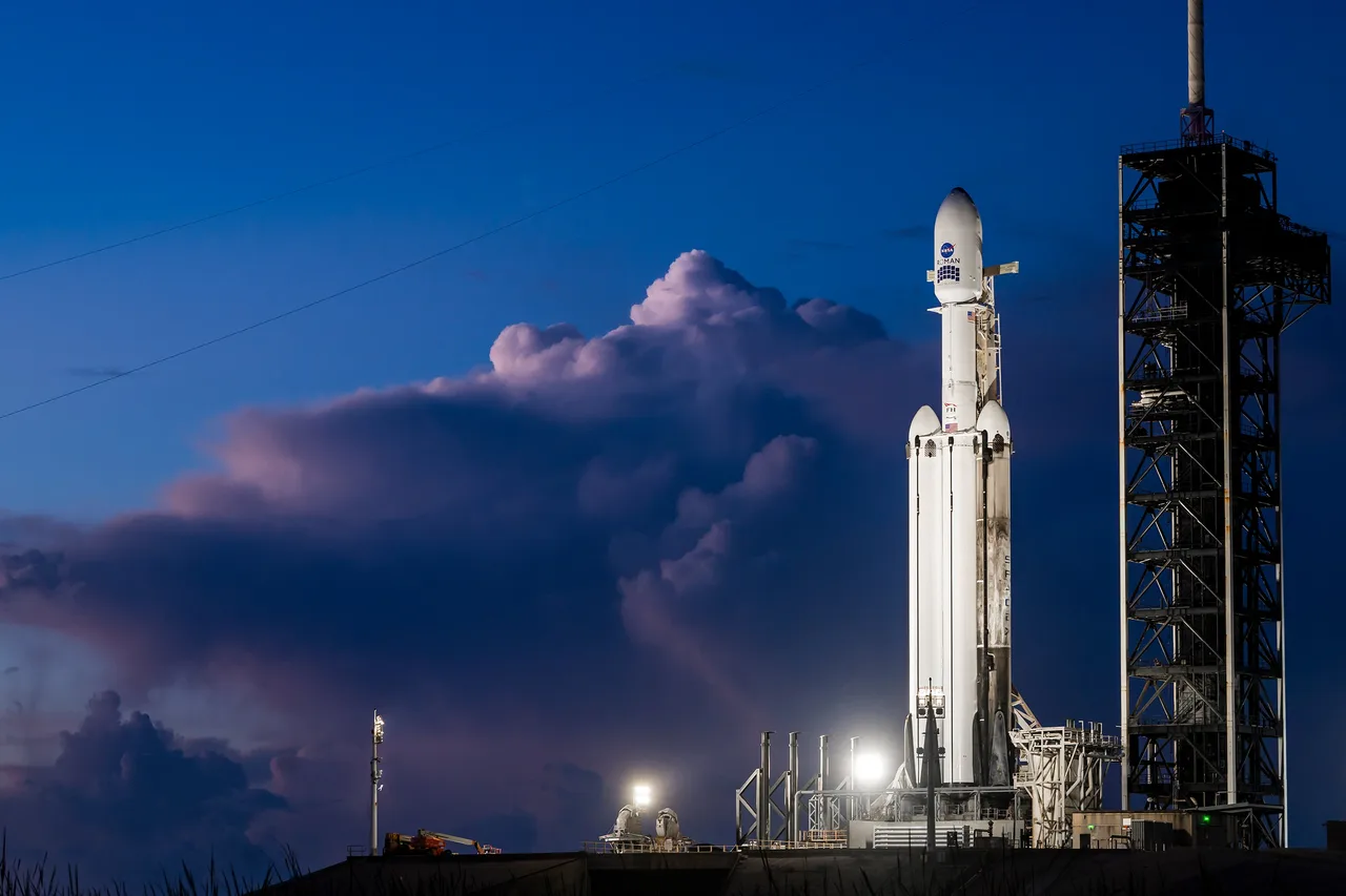 The telescope atop Falcon Heavy looks striking against the blue sky before launch
