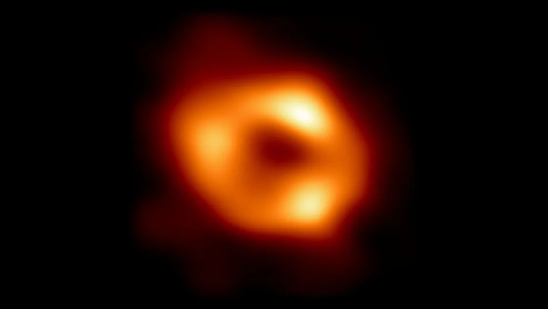 The black hole is dark, so what are we looking at?