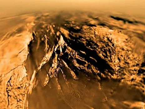 Titan's Earth-like terrain includes river channels, lakes, and dunes