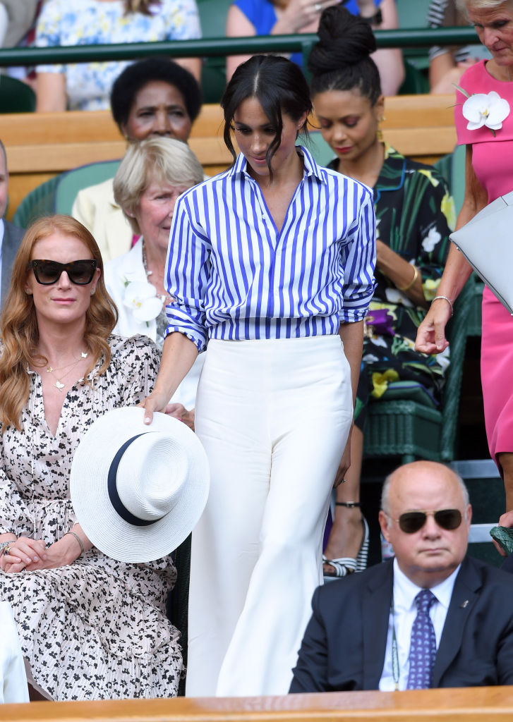 Meghan, Duchess of Sussex attends day twelve of the Wimbledon Tennis Championships at the All England Lawn Tennis and Croquet Club on July 14, 2018 in London, England.