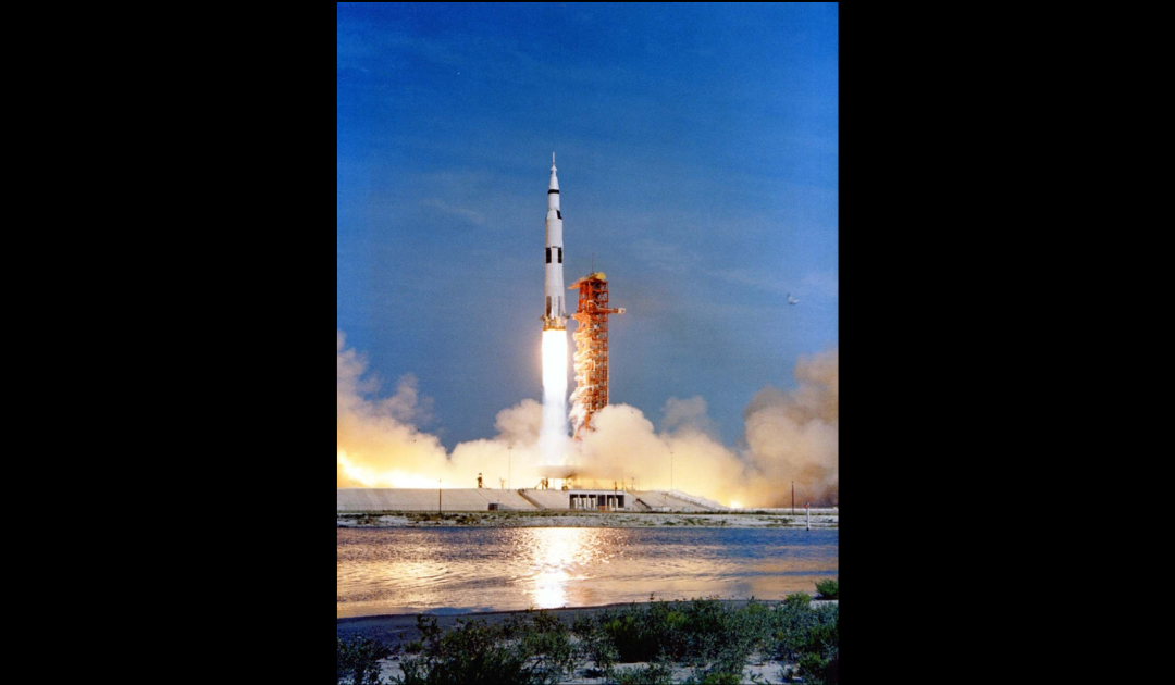 NASA's Saturn V rocket lifts off for the Apollo 11 mission from Kennedy Space Center. (Black background added on Canva)