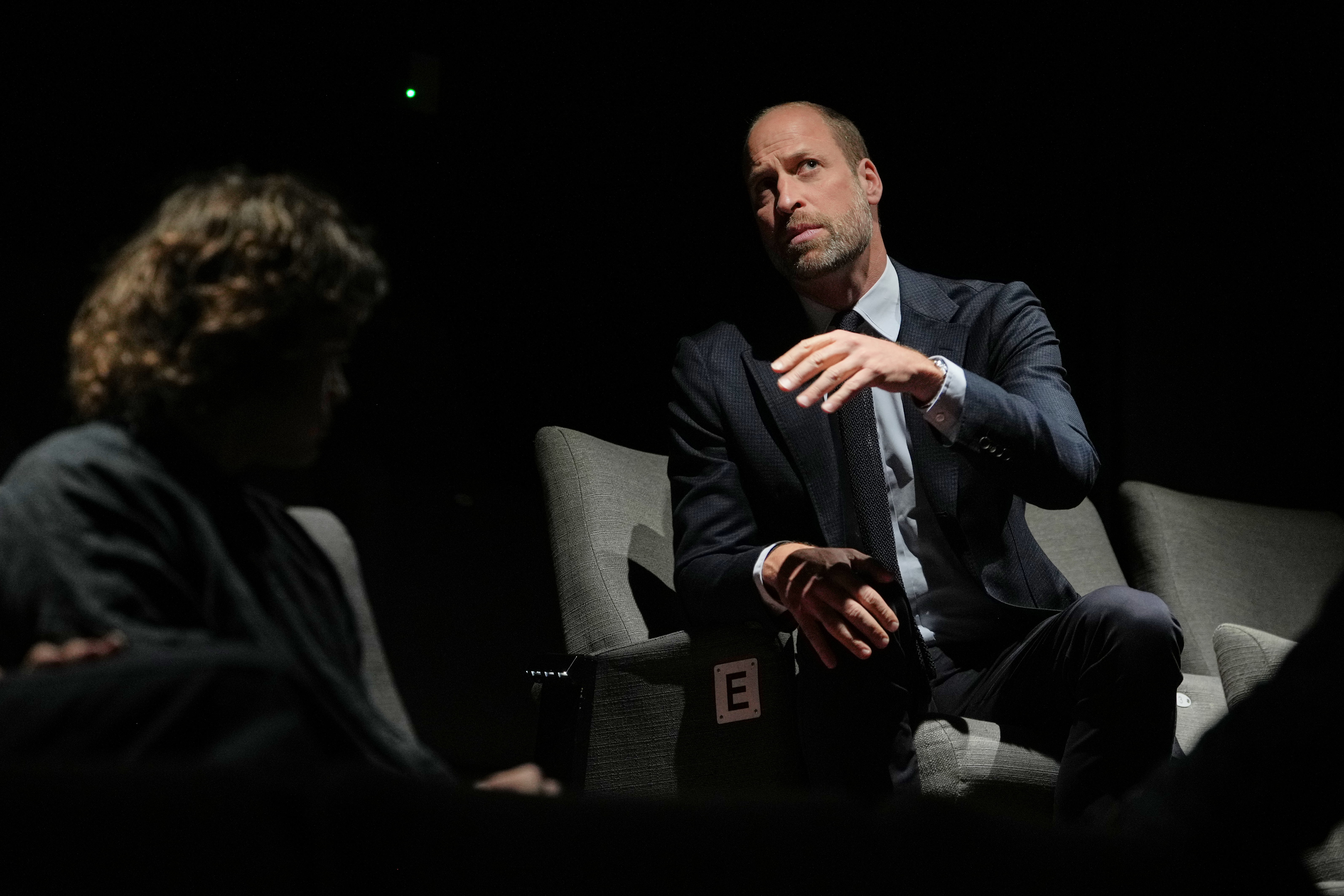 LONDON, ENGLAND - SEPTEMBER 22: Prince William, Prince of Wales, gestures as he sits in the auditorium while he visits ActOne, an independent, community-led cinema to celebrate the richness and talent of the British film industry, on September 22, 2026 in London, England. (Photo by Kin Cheung - WPA Pool/Getty Images)