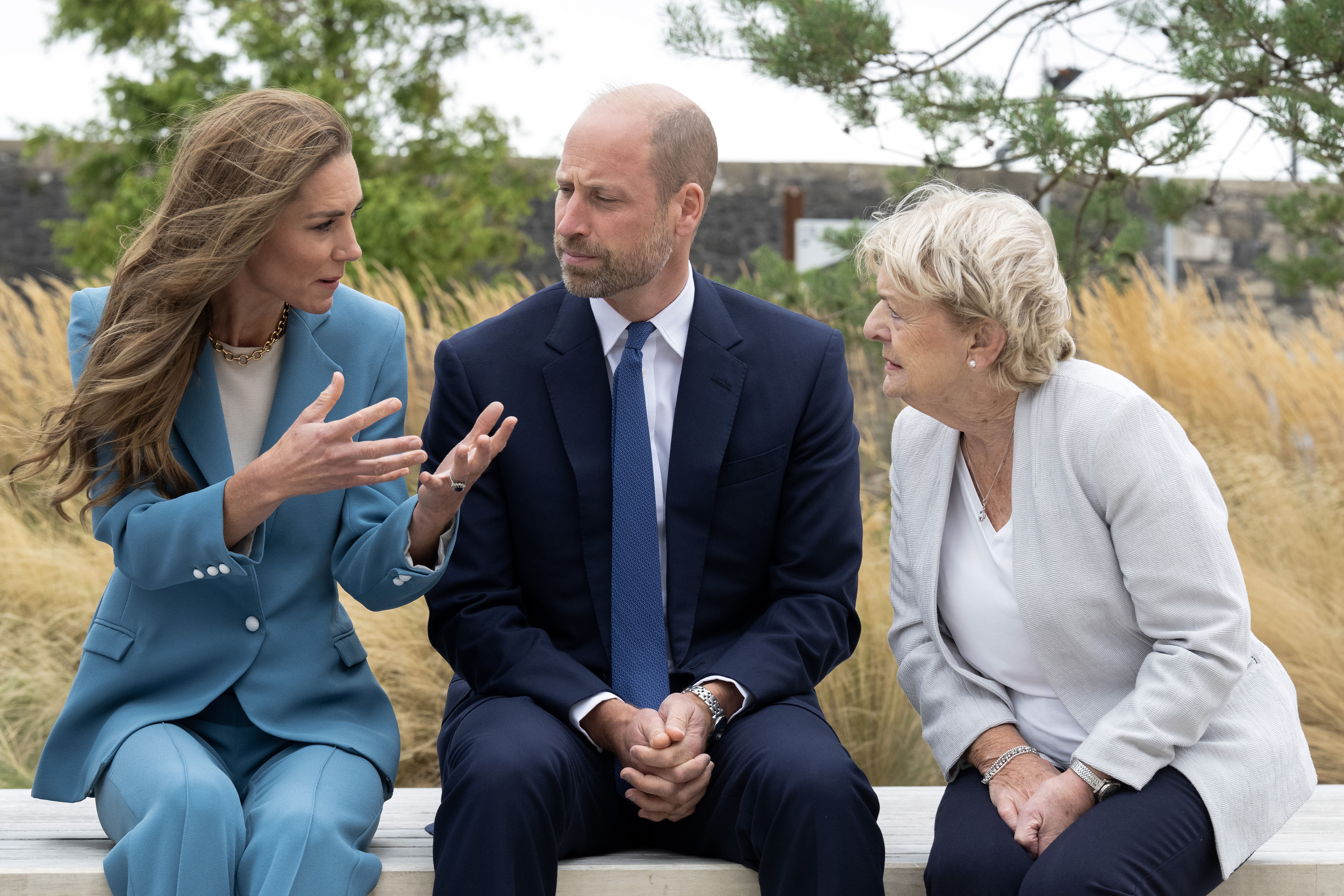 LIVERPOOL, ENGLAND - SEPTEMBER 10: Catherine, Princess of Wales and Prince William, Prince of Wales speak about the stigma surrounding mental health sat on the Gary Speed memorial bench with the late footballer’s mum, Carol, and Sam who has been supported by Everton in the Community during the launch of a Suicide Prevention Toolkit on World Suicide Prevention Day at Hill Dickinson Stadium on September 10, 2026 in Liverpool, England. The Prince of Wales and The Royal Foundation have launched