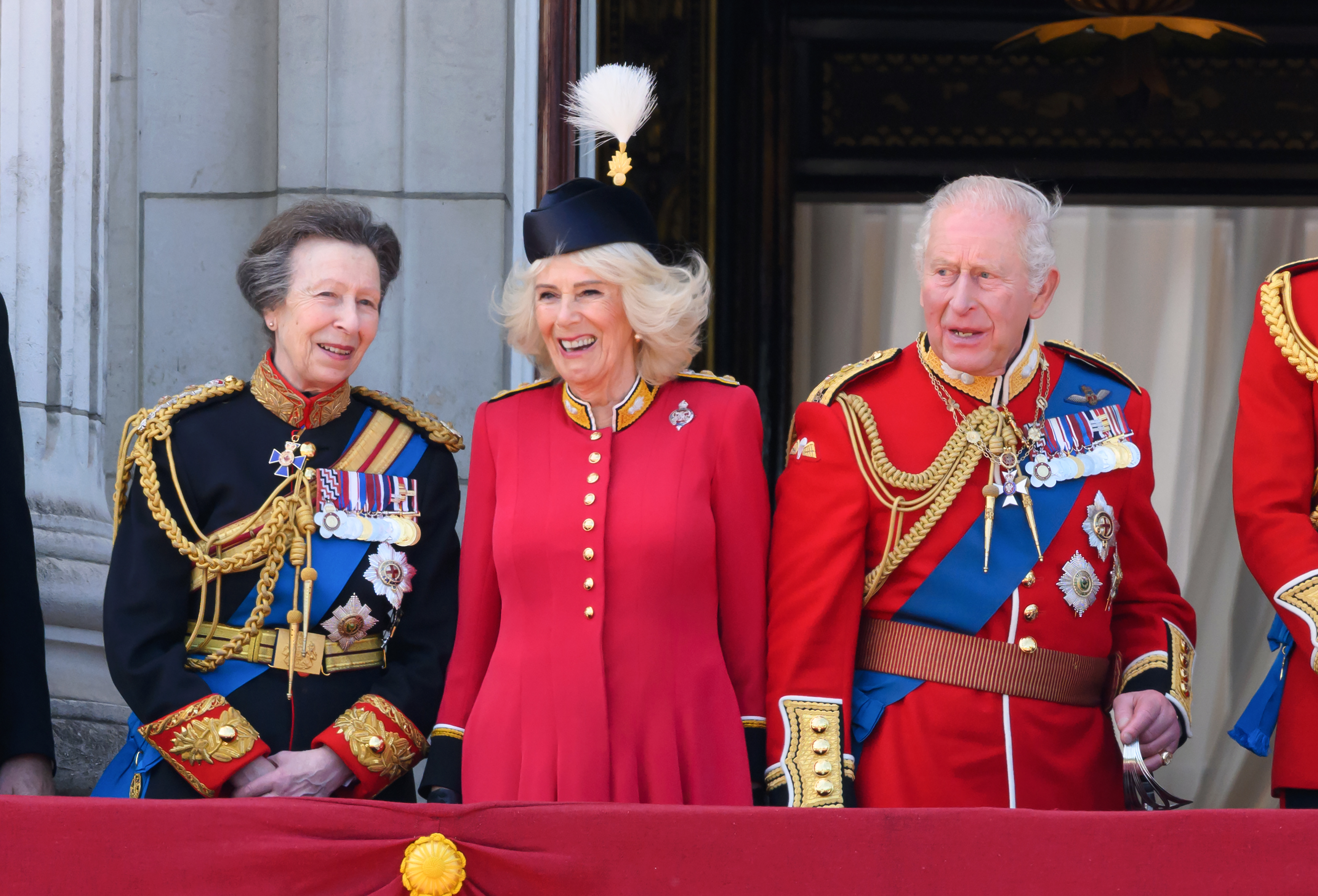 Princess Anne, Queen Camilla, and King Charles III watch an RAF flypast from the balcony of Buckingham Palace during 2026 Trooping The Colour (Image Source: Getty Images I  Karwai Tang/WireImage)