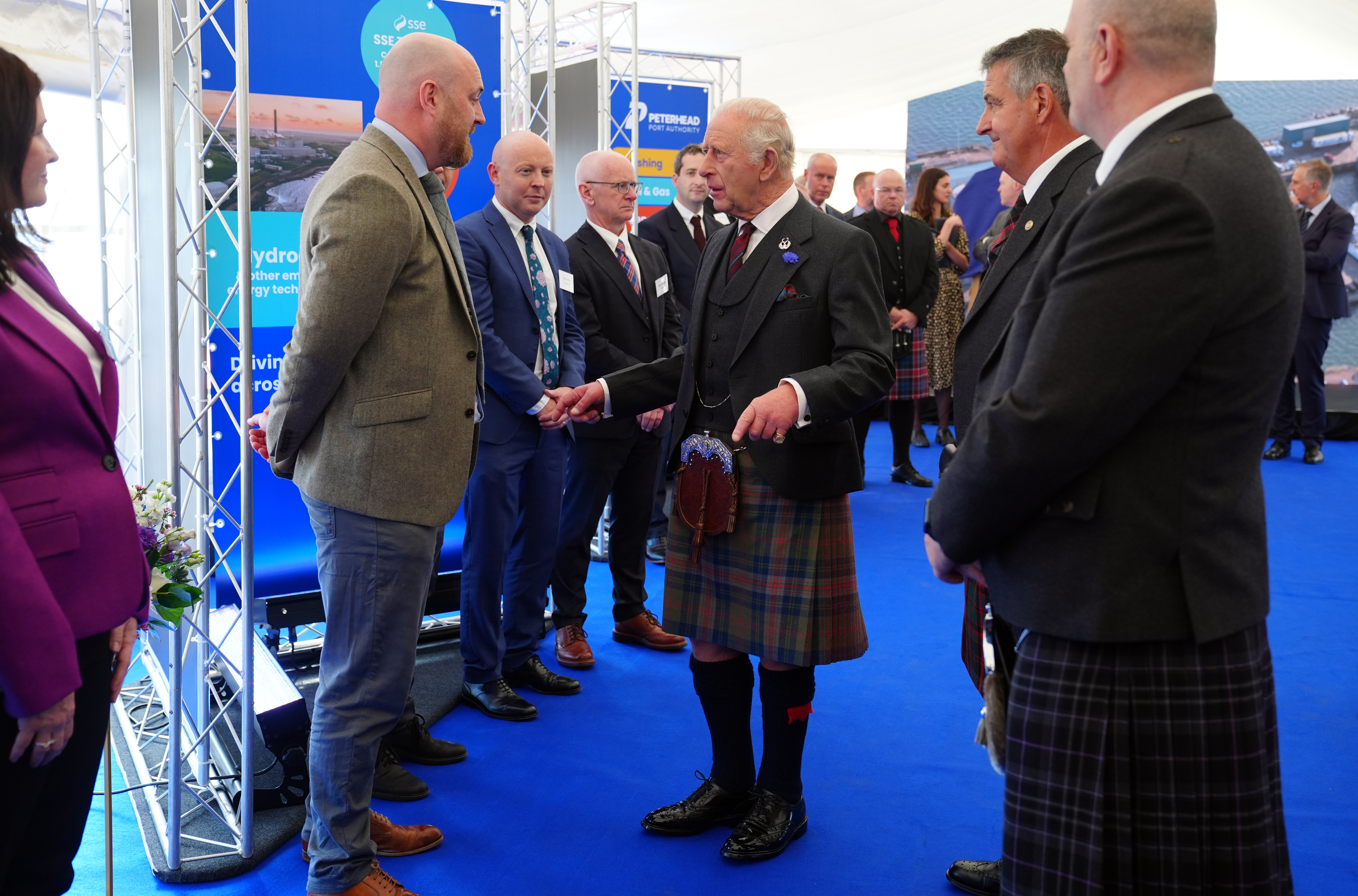 ABERDEEN, SCOTLAND - SEPTEMBER 22: King Charles III during a visit to Peterhead Port to meet organisations involved in the area's local energy ecosystem, which is helping to drive the UK's transition to clean and renewable energy on September 22, 2026 in Aberdeen, Scotland. (Photo by Jane Barlow - Pool/Getty Images)