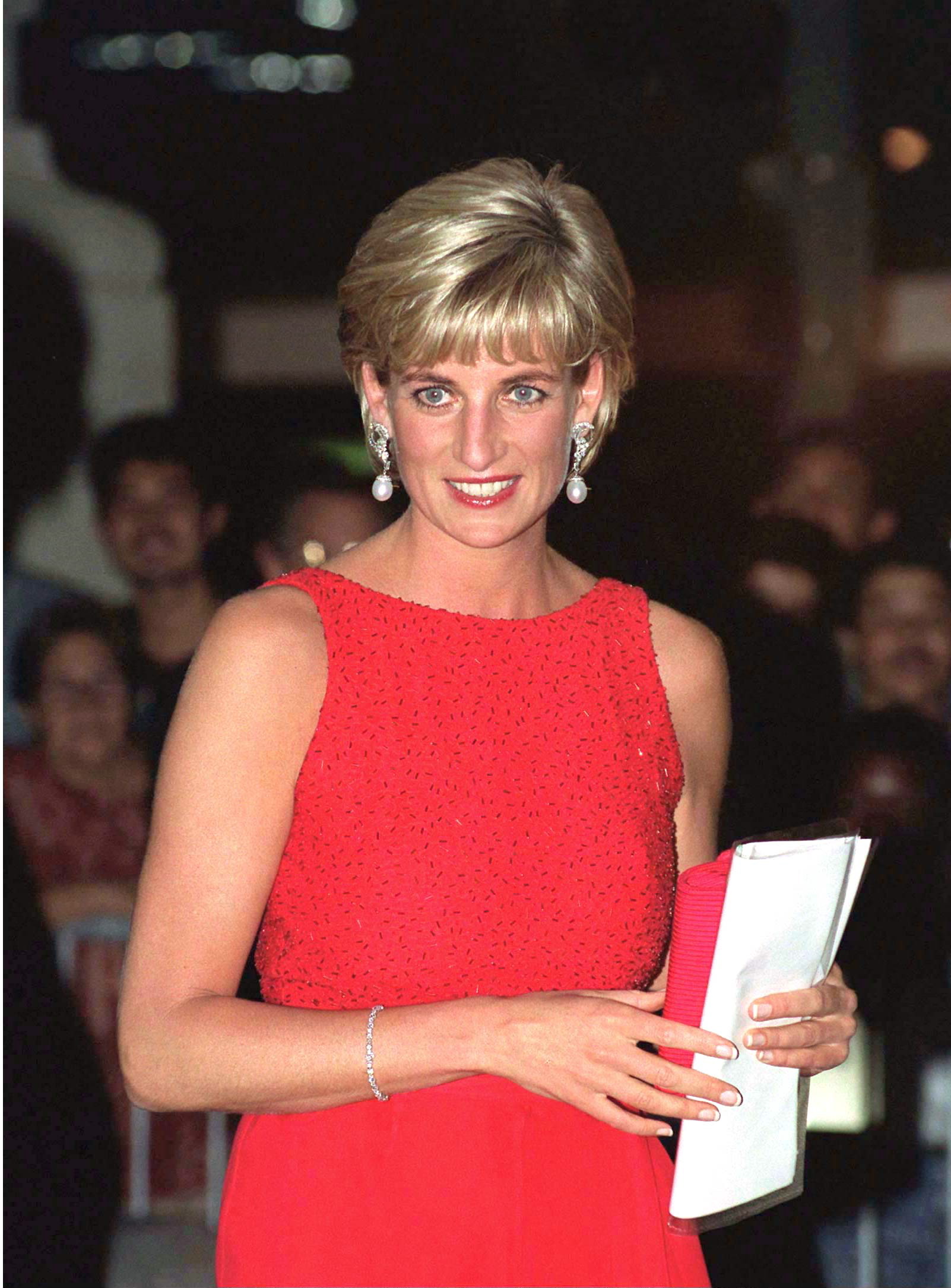WASHINGTON, UNITED KINGDOM - JUNE 17:  (NOT FOR NON-EDITORIAL USE WITHOUT PRIOR PERMISSION OF COPYRIGHT HOLDER) Diana, Princess Of Wales,  Attending A Gala  Dinner In Washington Held By The American Red  Cross  To Raise Funds For Landmine Victims  Around The World.(red Dress Designed By Jacques Azagury)  (Photo by Tim Graham Photo Library via Getty Images)