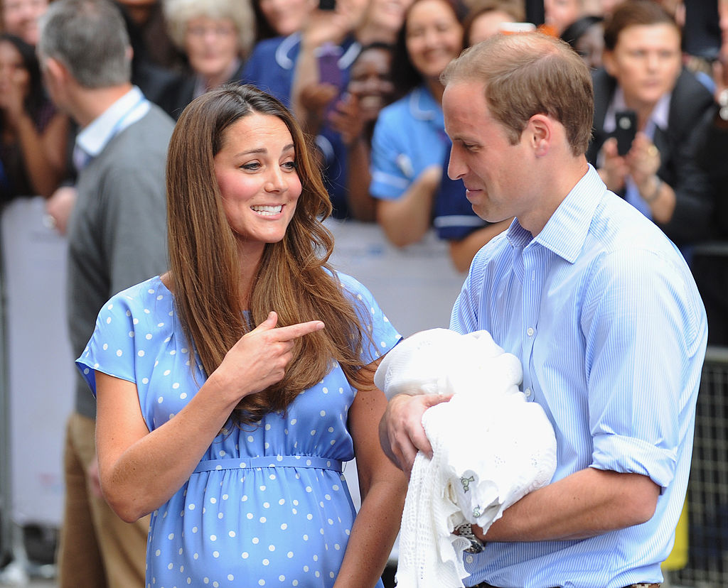 Prince William and Kate Middleton depart The Lindo Wing with their newborn son, Prince George, at St Mary's Hospital (Image Source: Getty Images I Ferdaus Shamim/WireImage)