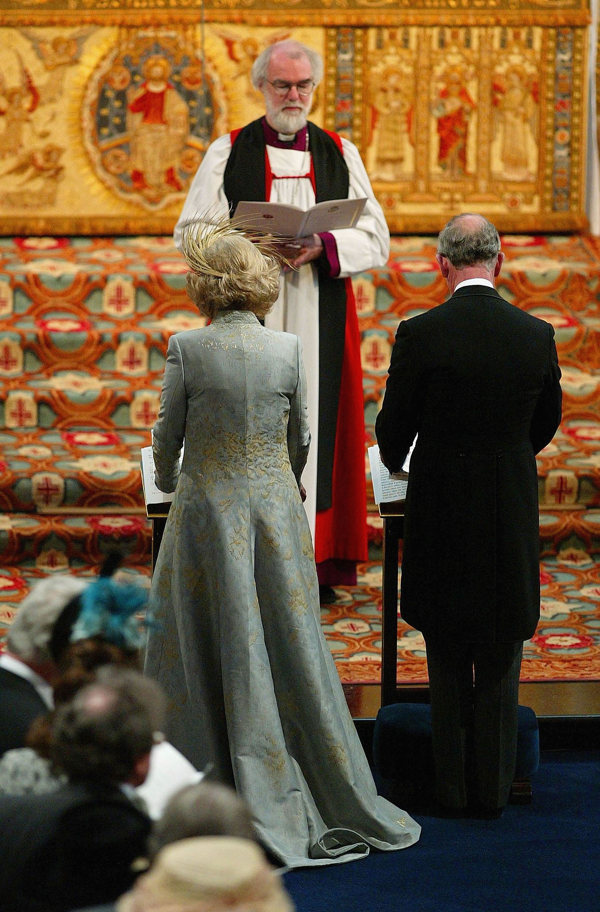 WINDSOR, ENGLAND - APRIL 9: (NO UK SALES FOR 28 DAYS) TRH Prince Charles and The Duchess Of Cornwall, Camilla Parker Bowles is blessed by the Archbishop of Canterbury, Dr. Rowan Williams, when they  attend the Service of Prayer and Dedication following their marriage at The Guildhall, at Windsor Castle on April 9, 2005 in Berkshire, England. (Photo by ROTA/Anwar Hussein Collection/Getty Images)  *** Local Caption *** Prince of Wales;Duchess Of Cornwall;Dr. Rowan Williams