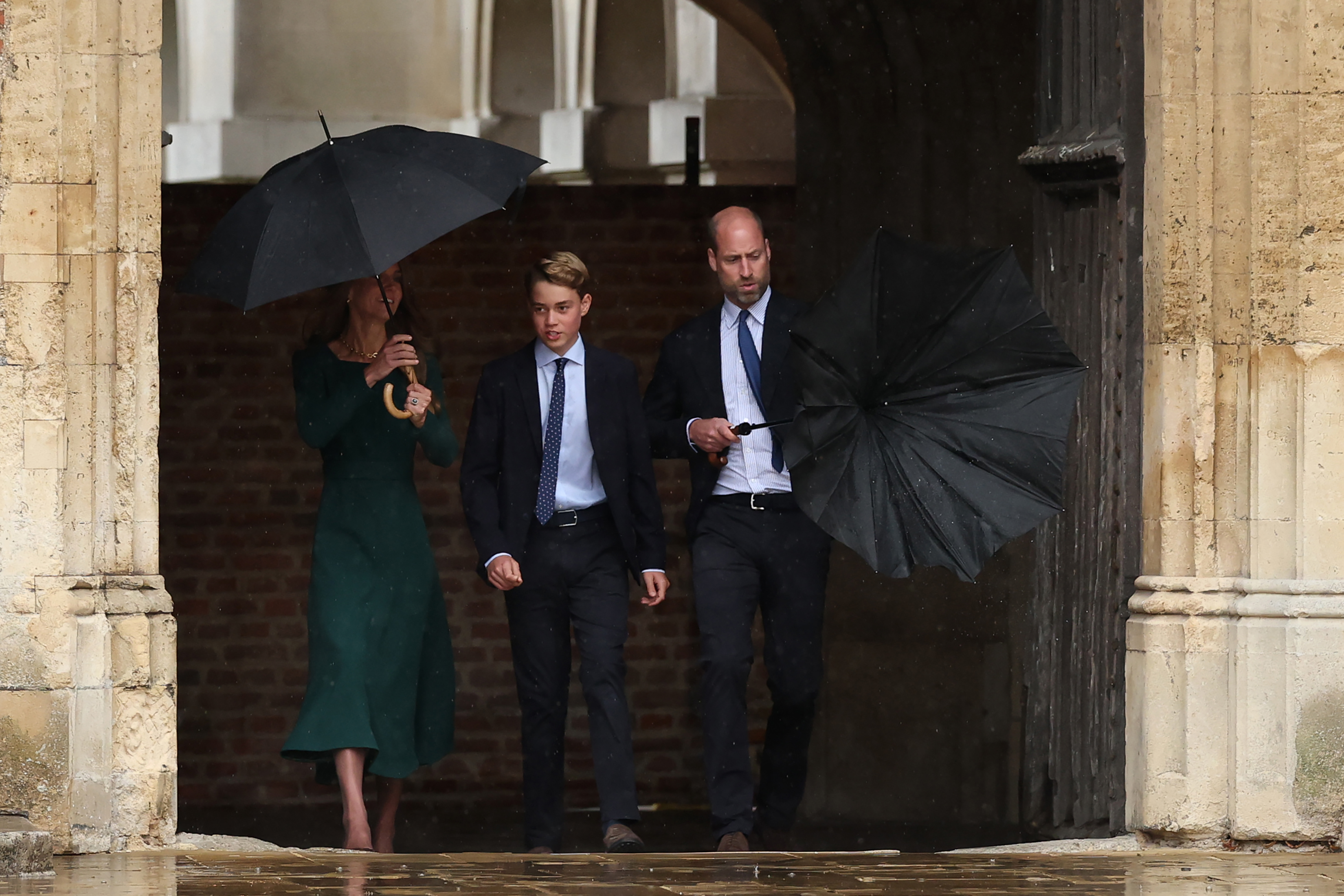 ETON, ENGLAND - SEPTEMBER 8: Catherine, Princess of Wales (L) and Prince William, Prince of Wales (R) walk with their 13-year-old son, Prince George of Wales (C), as he arrives for his first day at Eton College on September 8, 2026 in Berkshire, England. (Photo by Adrian Dennis - WPA Pool/Getty Images)
