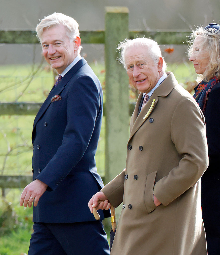 King Charles accompanied by his Principal Private Secretary Sir Clive Alderton, departs after attending Sunday service on the Sandringham estate (Image Source: Getty Images I Max Mumby/Indigo)