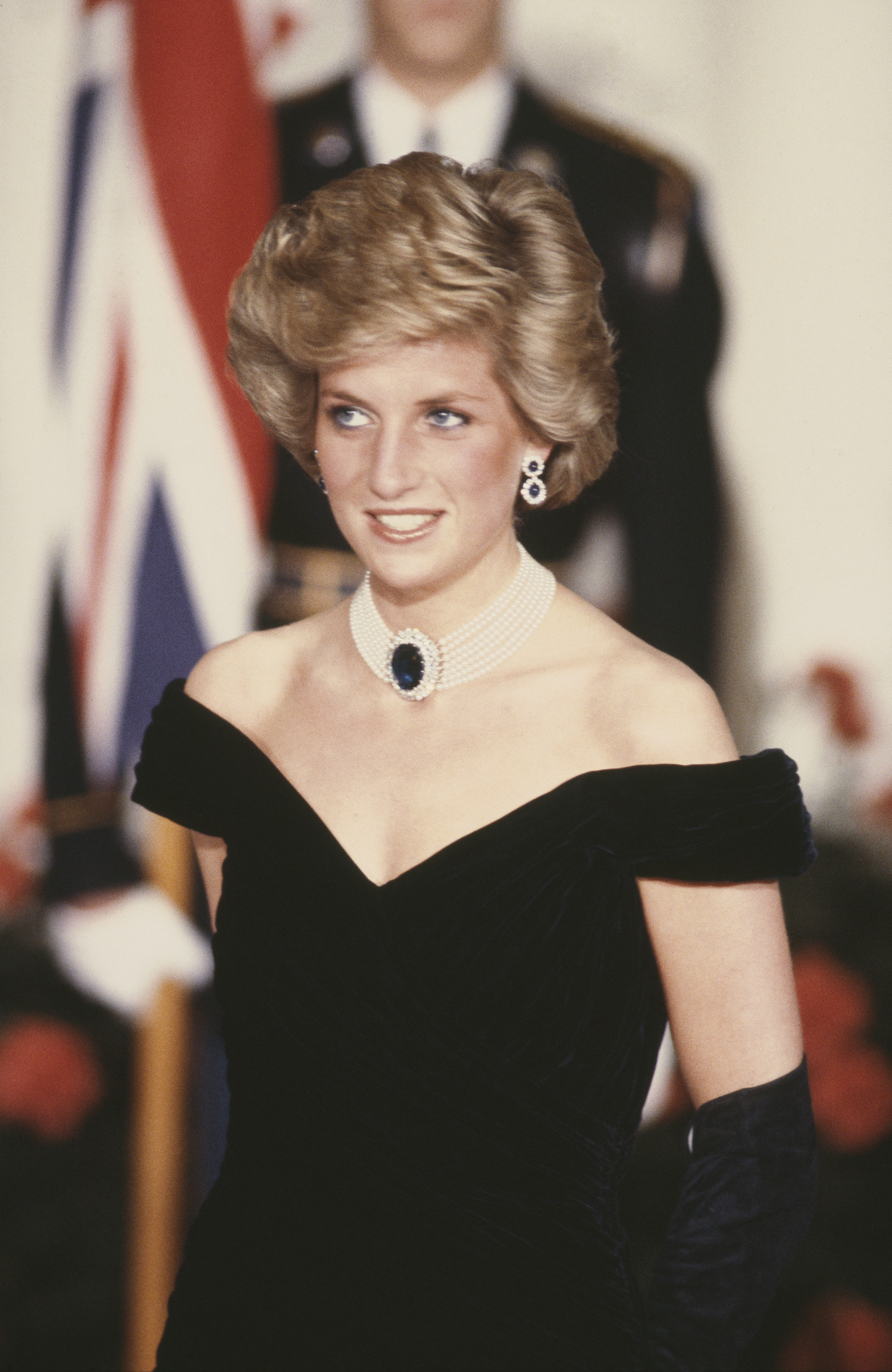 Princess Diana wearing a black evening gown by Victor Edelstein during a ball hosted by Ronald and Nancy Reagan at the White House in Washington, DC, in November 1985. (Image Source: Getty Images | Terry Fincher/Princess Diana Archive)