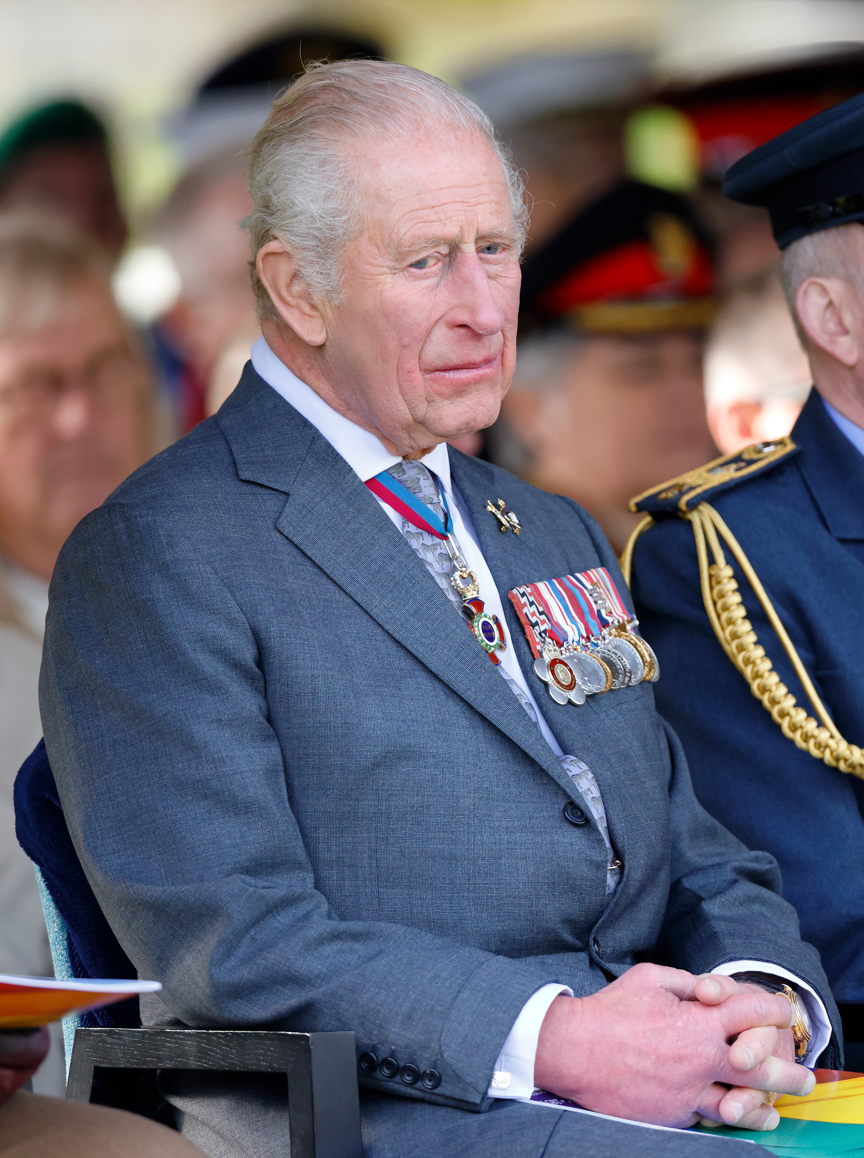 ALREWAS, STAFFORDSHIRE - OCTOBER 27: (EMBARGOED FOR PUBLICATION IN UK NEWSPAPERS UNTIL 24 HOURS AFTER CREATE DATE AND TIME) King Charles III attends the dedication ceremony for a new memorial to the Armed Forces LGBT+ community at the National Memorial Arboretum on October 27, 2025 in Alrewas, Staffordshire. The memorial, titled 'An Opened Letter' is the first to be dedicated to members of the LGBT+ community in the armed forces. Until 2000, it was illegal for members of the British Armed Forces to be openly gay. The memorial is dedicated to those who suffered under this law as well as those currently serving in the military. (Photo by Max Mumby/Indigo/Getty Images)