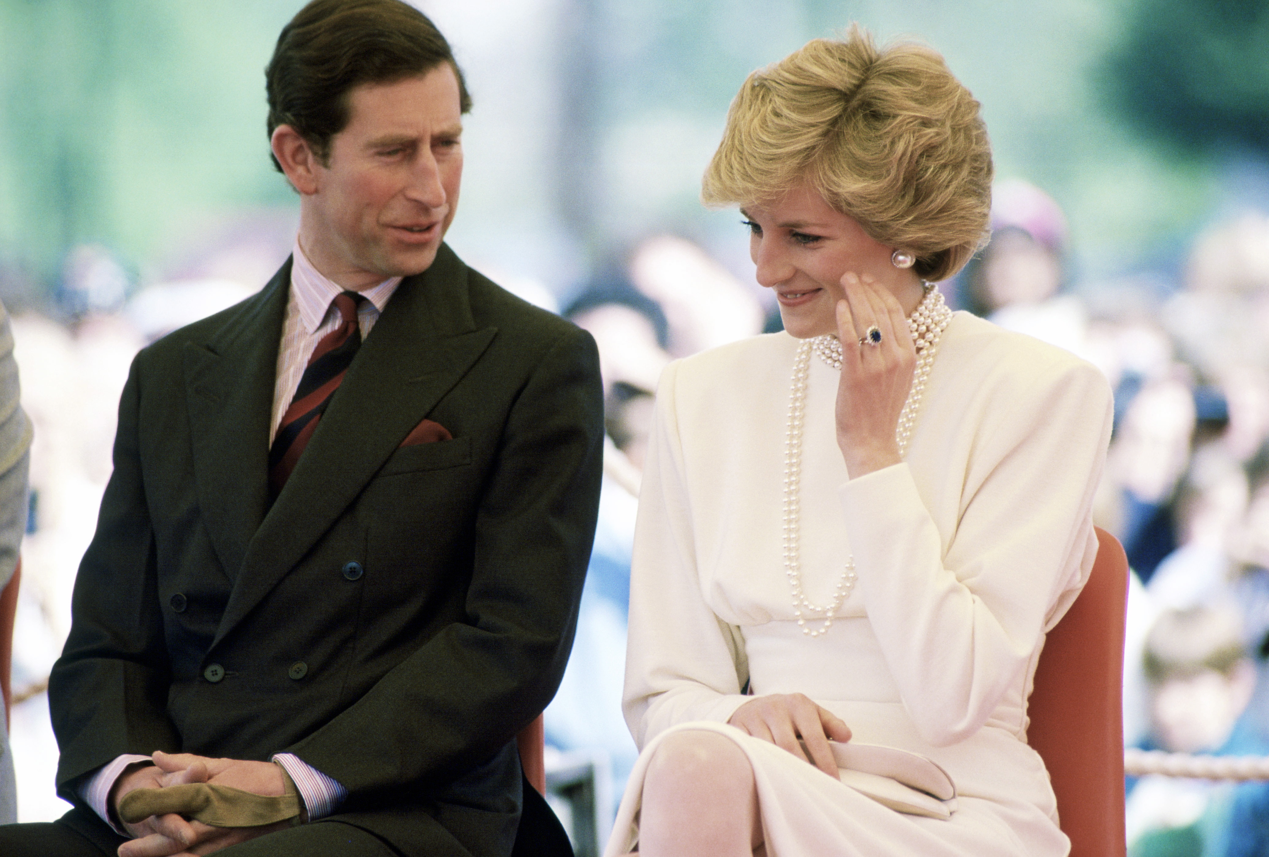 BURNABI, CANADA - MAY 06:  The Prince And Princess Of Wales Talking Together In Central Park During A Visit To Burnabi, Canada. On This Day She Fainted During A Visit To The Expo Exhibition.  (Photo by Tim Graham Photo Library via Getty Images)