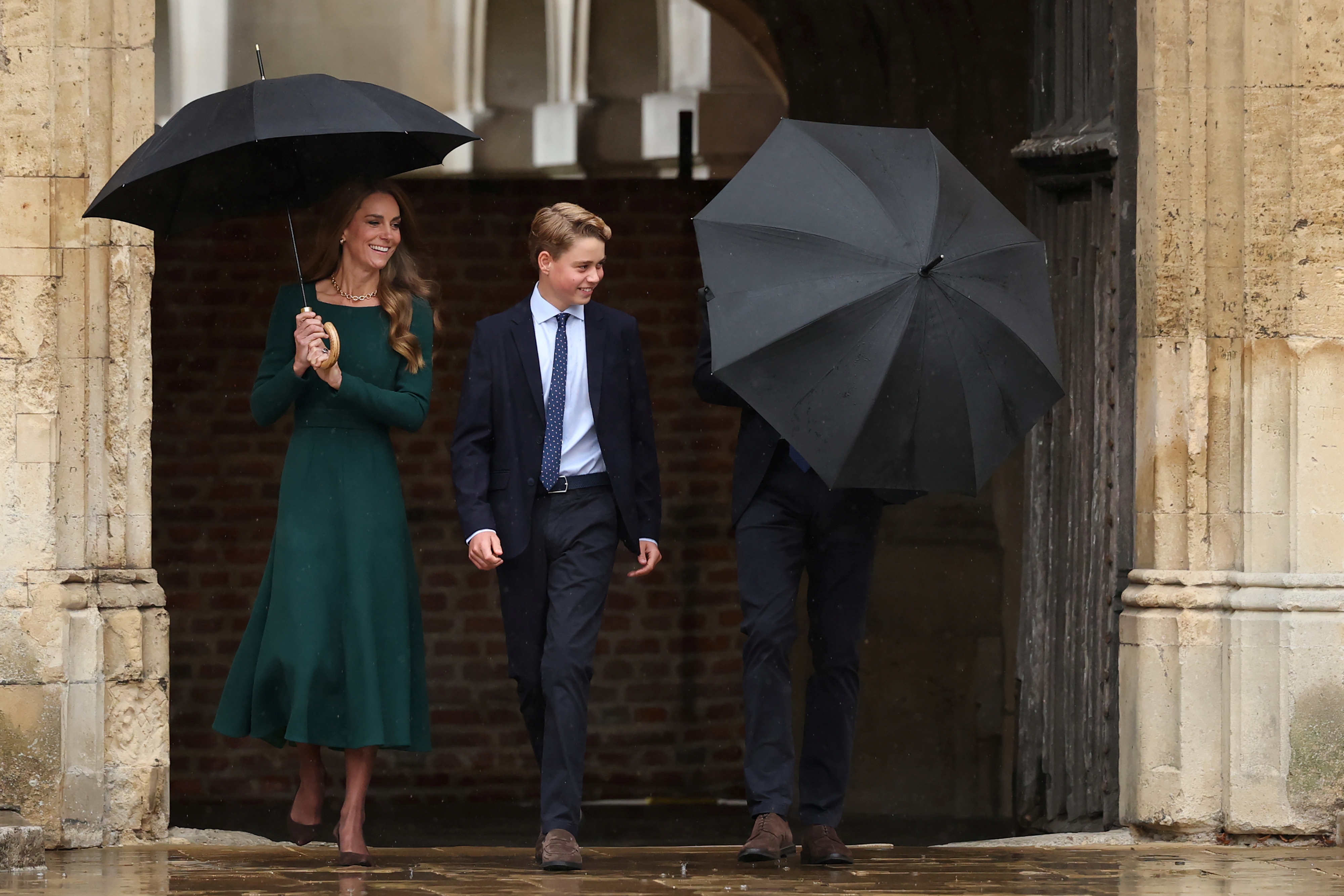 ETON, ENGLAND - SEPTEMBER 8: Catherine, Princess of Wales (L) and Prince William, Prince of Wales (R) walk with their 13-year-old son, Prince George of Wales (C), as he arrives for his first day at Eton College on September 8, 2026 in Berkshire, England. (Photo by Adrian Dennis - WPA Pool/Getty Images)