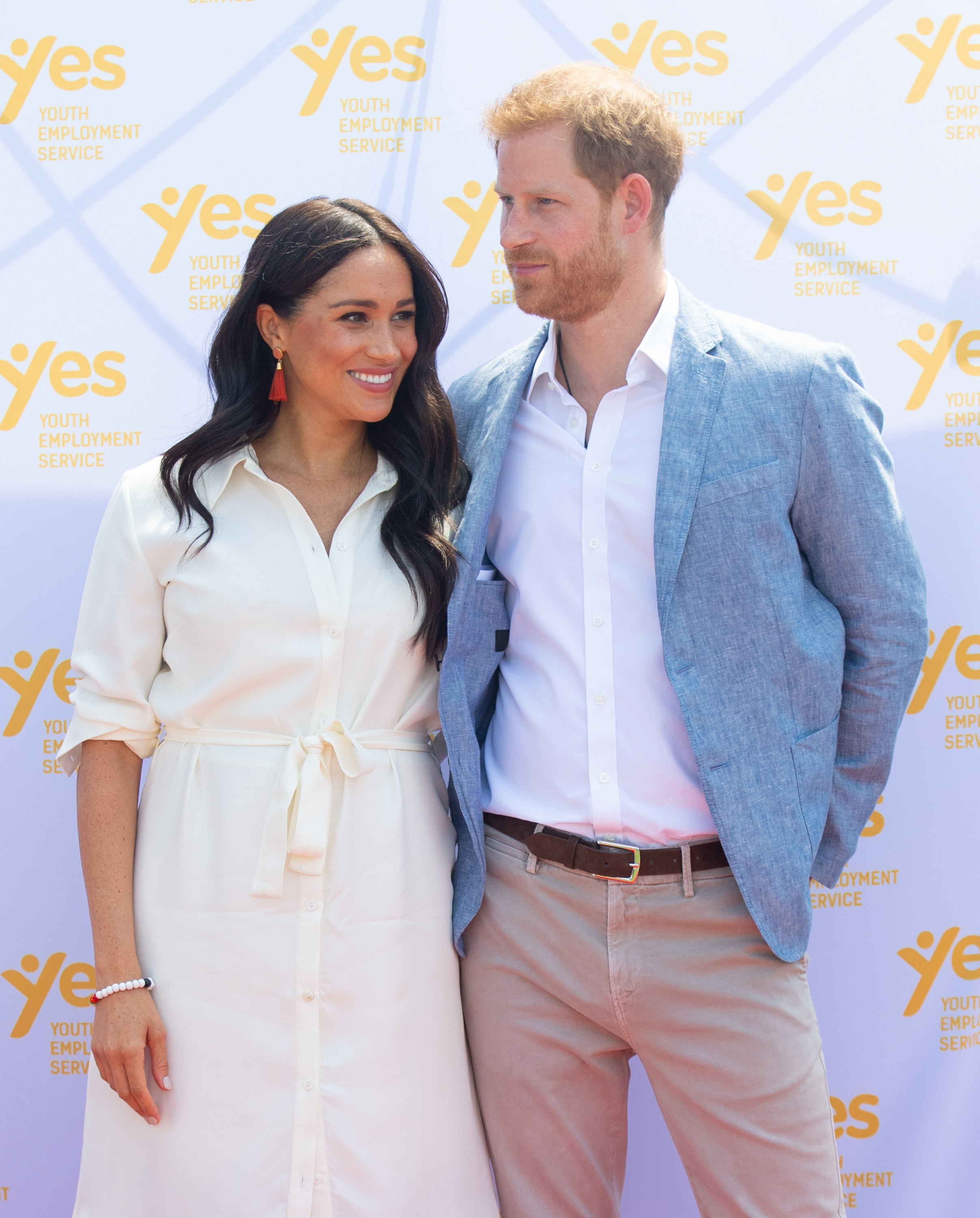 JOHANNESBURG, SOUTH AFRICA - OCTOBER 02: (UK OUT FOR 28 DAYS) Meghan, Duchess of Sussex accompanied by Prince Harry, Duke of Sussex visit the Tembisa Township to learn about Youth Employment Services during their royal tour of South Africa on October 02, 2019 in Johannesburg, South Africa.  (Photo by Pool/Samir Hussein/WireImage)