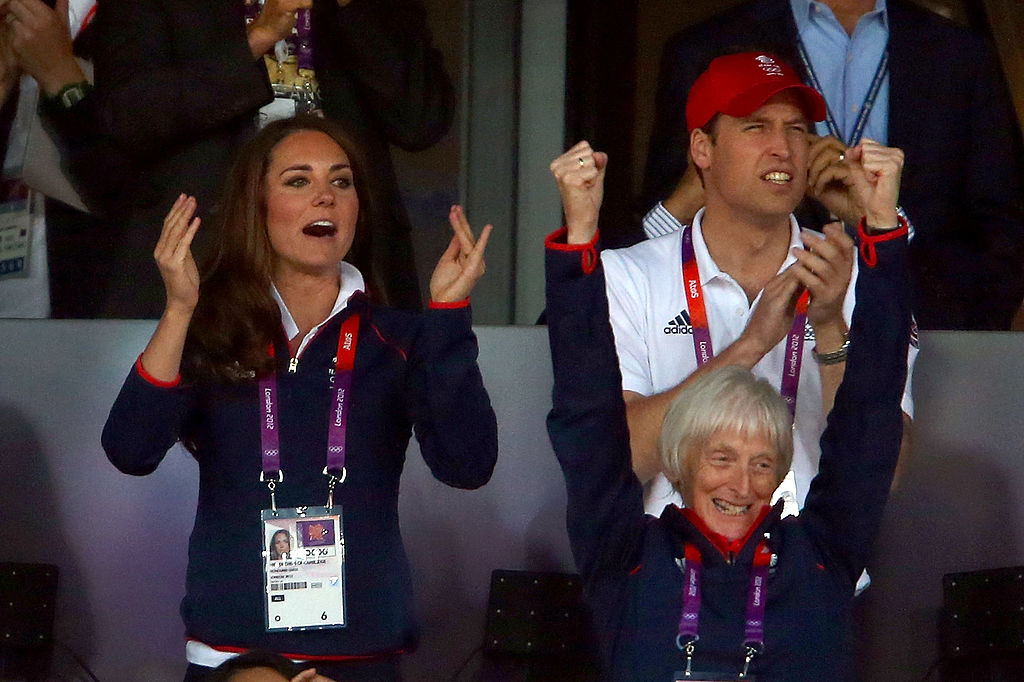 Kate Middleton and Prince William cheering during the track and field events of the 2012 London Olympic Games (Image Source: Getty Images I Alexander Hassenstein)