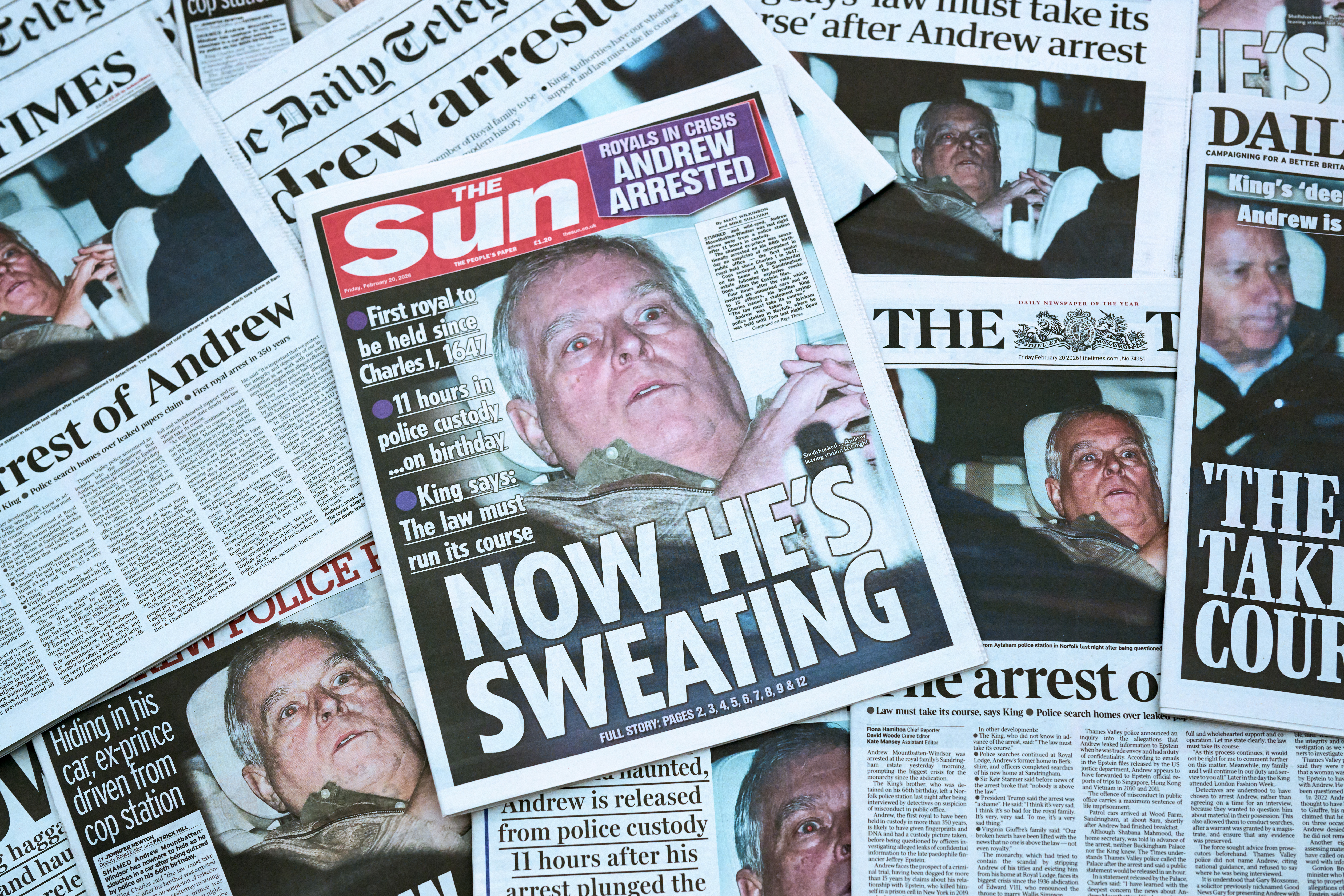 LONDON, ENGLAND - FEBRUARY 20: (EDITOR'S NOTE: CROPPING OF THIS IMAGE IS NOT PERMITTED) In this photo illustration, multiple British newspapers with an image and joining story of Andrew Mountbatten-Windsor are seen on February 20, 2026 in London, England. Andrew Mountbatten-Windsor was arrested on his 66th birthday, 19 February 2026, on suspicion of misconduct in public office following revelations contained in the Epstein files. The former duke has denied any wrong doing in relation to his association with Jeffrey Epstein. (Photo Illustration by Gareth Cattermole/Getty Images)