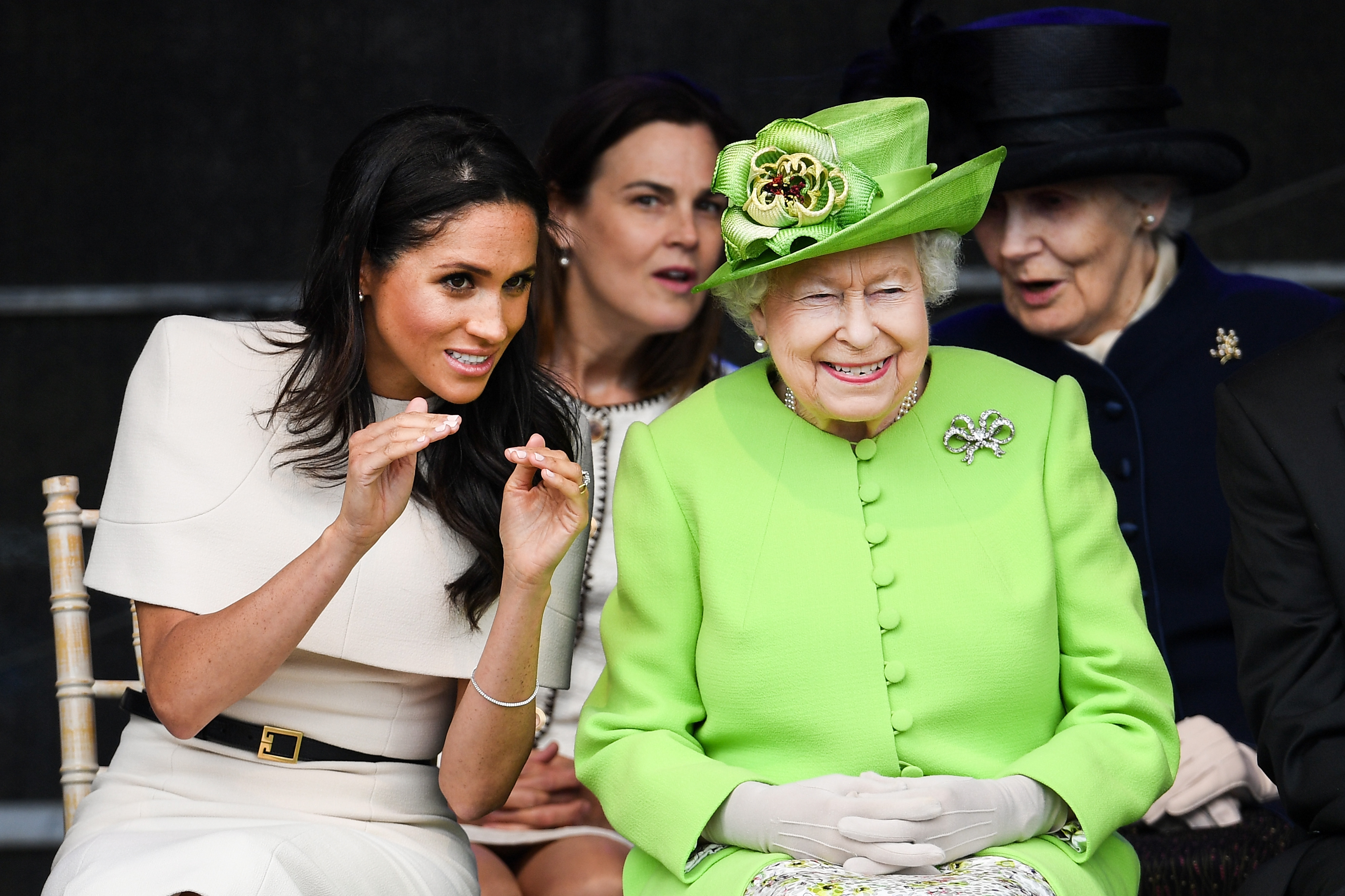 <<enter caption here>> on June 14, 2018 in Chester, England. Meghan Markle married Prince Harry last month to become The Duchess of Sussex and this is her first engagement with the Queen. During the visit the pair will open a road bridge in Widnes and visit The Storyhouse and Town Hall in Chester.