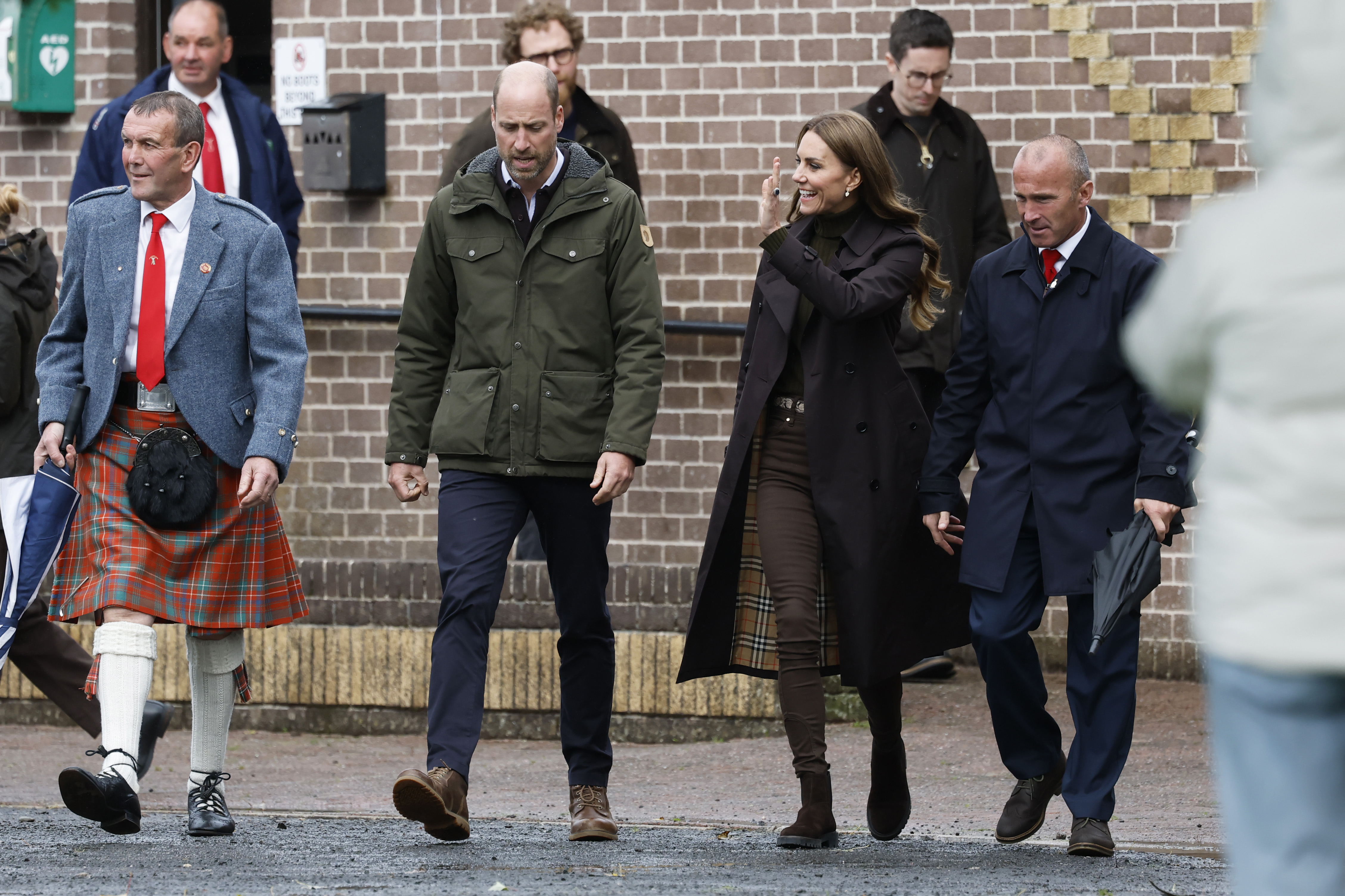 ROTHESAY, ISLE OF BUTE, SCOTLAND - SEPTEMBER 17: Prince William, Prince of Wales, and Catherine, Princess of Wales, head to the pitch while visiting Bute Shinty Club during a royal visit to the Isle of Bute on September 17, 2026 in Rothesay, Isle of Bute, Scotland. The Prince and Princess of Wales, who also hold the titles of The Duke and Duchess of Rothesay, visited the island to celebrate community, connection and volunteering. (Photo by Jeff J Mitchell/Getty Images)