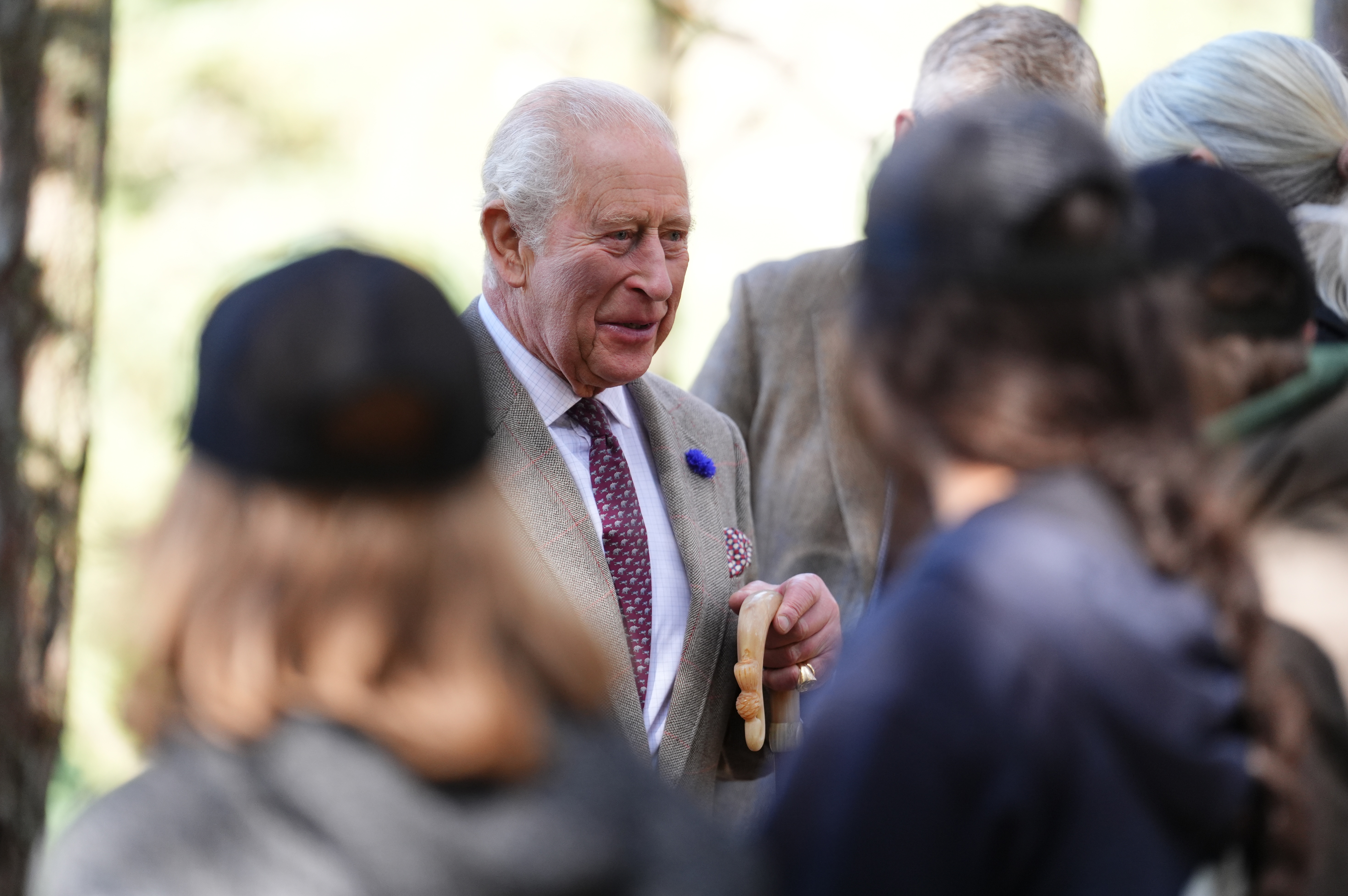 King Charles meets community leaders, firefighters, volunteers and landowners who played a vital role in containing the Glenmore and Abernethy wildfire during a visit to the Cairngorms National Park in Scotland (Image Source: AP | Andrew Milligan/Pool)