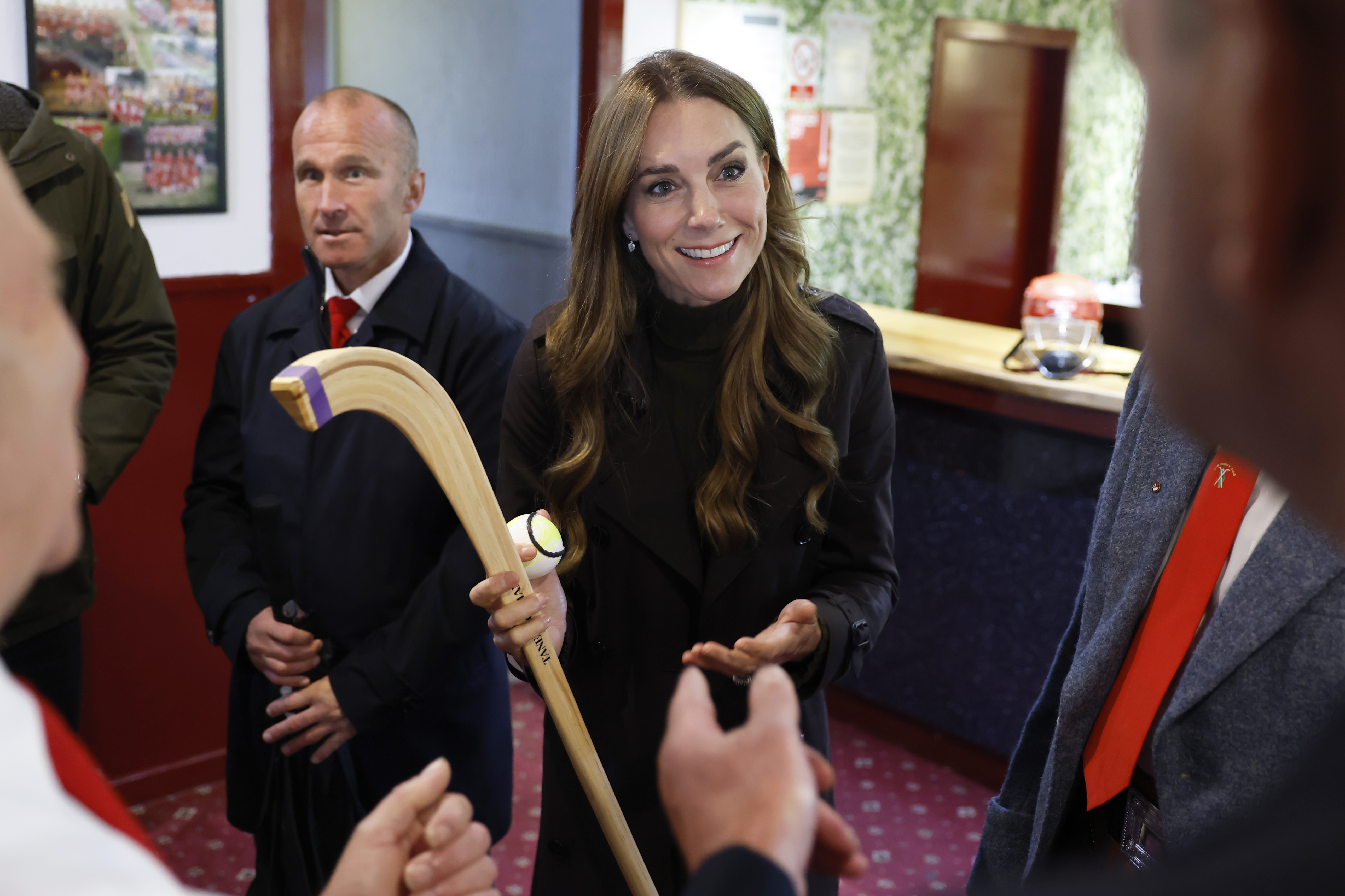 ROTHESAY, ISLE OF BUTE, SCOTLAND - SEPTEMBER 17: Catherine, Princess of Wales, meets representatives from the club's senior and youth teams, while visiting Bute Shinty Club in Rothesay, during a royal visit to the Isle of Bute on September 17, 2026 in Rothesay, Isle of Bute, Scotland. The Prince and Princess of Wales, who also hold the titles of TheDuke and Duchess of Rothesay, visited the island to celebrate community, connection and volunteering. (Photo by Jeff J Mitchell/Getty Images)