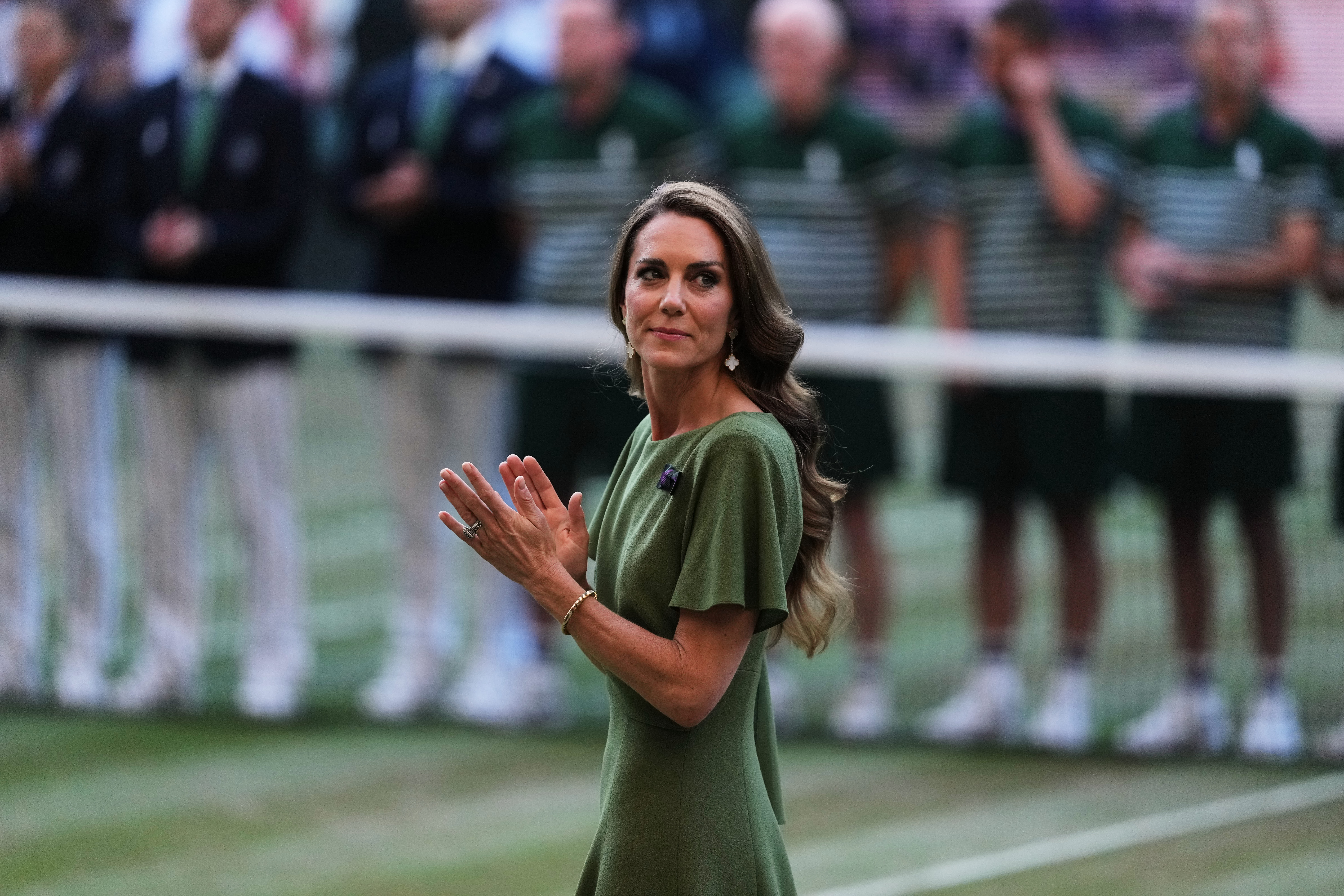 Britain Princess Kate applauds on centre court after presenting the trophies to Jannik Sinner of Italy and Alexander Zverev of Germany after their men's singles final at Wimbledon Tennis Championships in London, Sunday, July 12, 2026. (AP Photo/Kirsty Wigglesworth)