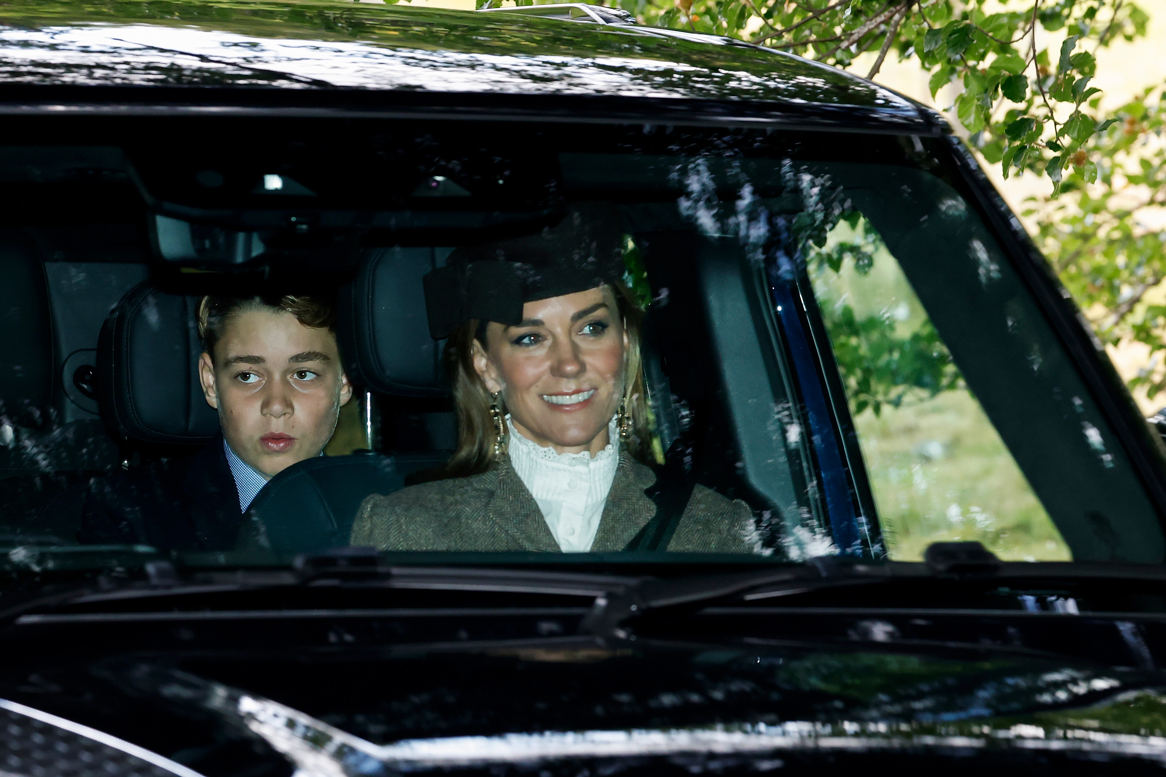 Kate Middleton and Prince George arrive for a service at Crathie Kirk Church near Balmoral Castle (Image Source: Getty Images I Jeff J Mitchell)