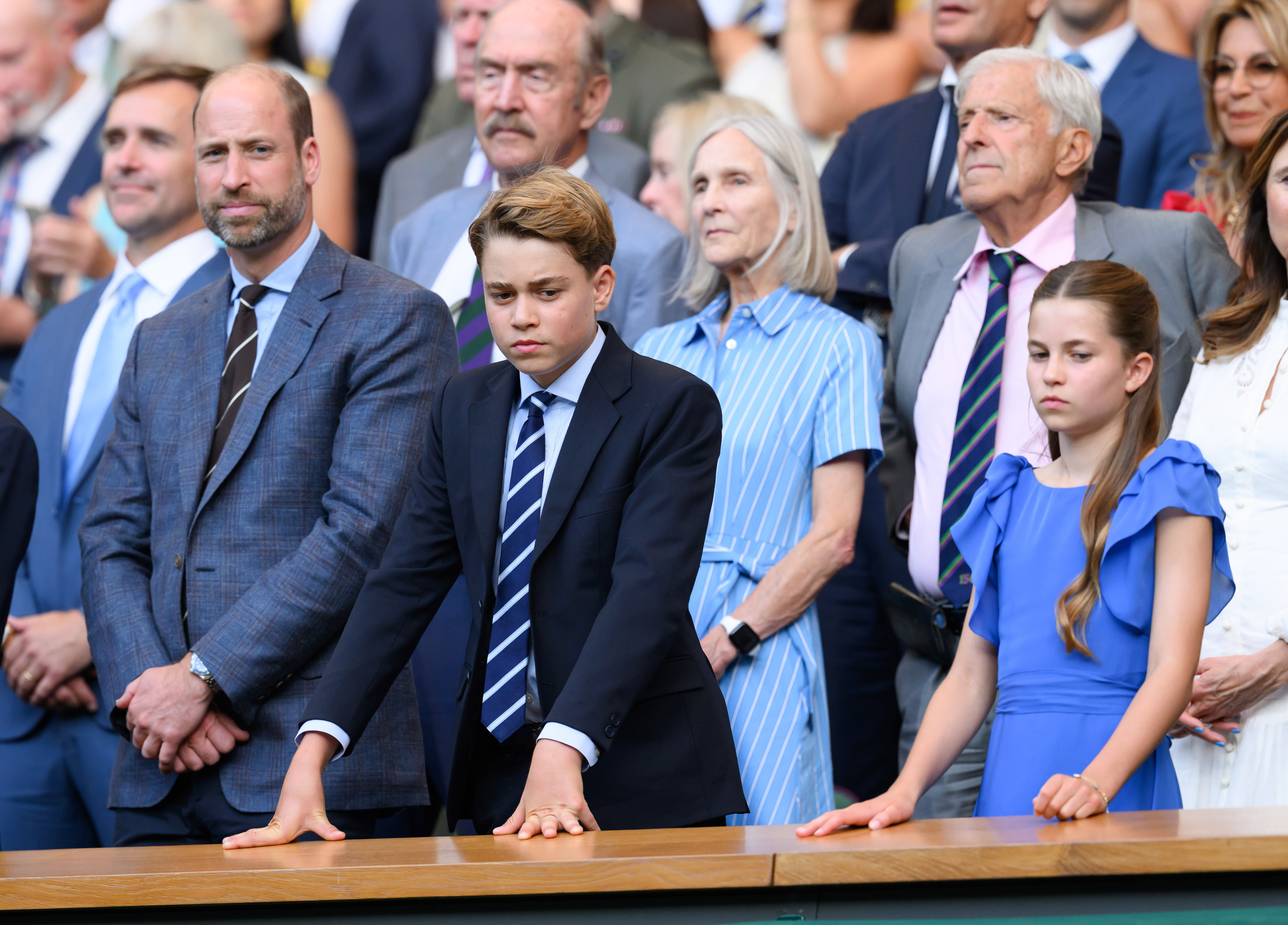 LONDON, ENGLAND - JULY 12: (L-R) Prince William, Prince of Wales, Prince George of Wales and Princess Charlotte of Wales attend day fourteen of the 2026 Wimbledon Tennis Championships at All England Lawn Tennis and Croquet Club on July 12, 2026 in London, England. (Photo by Karwai Tang/WireImage)